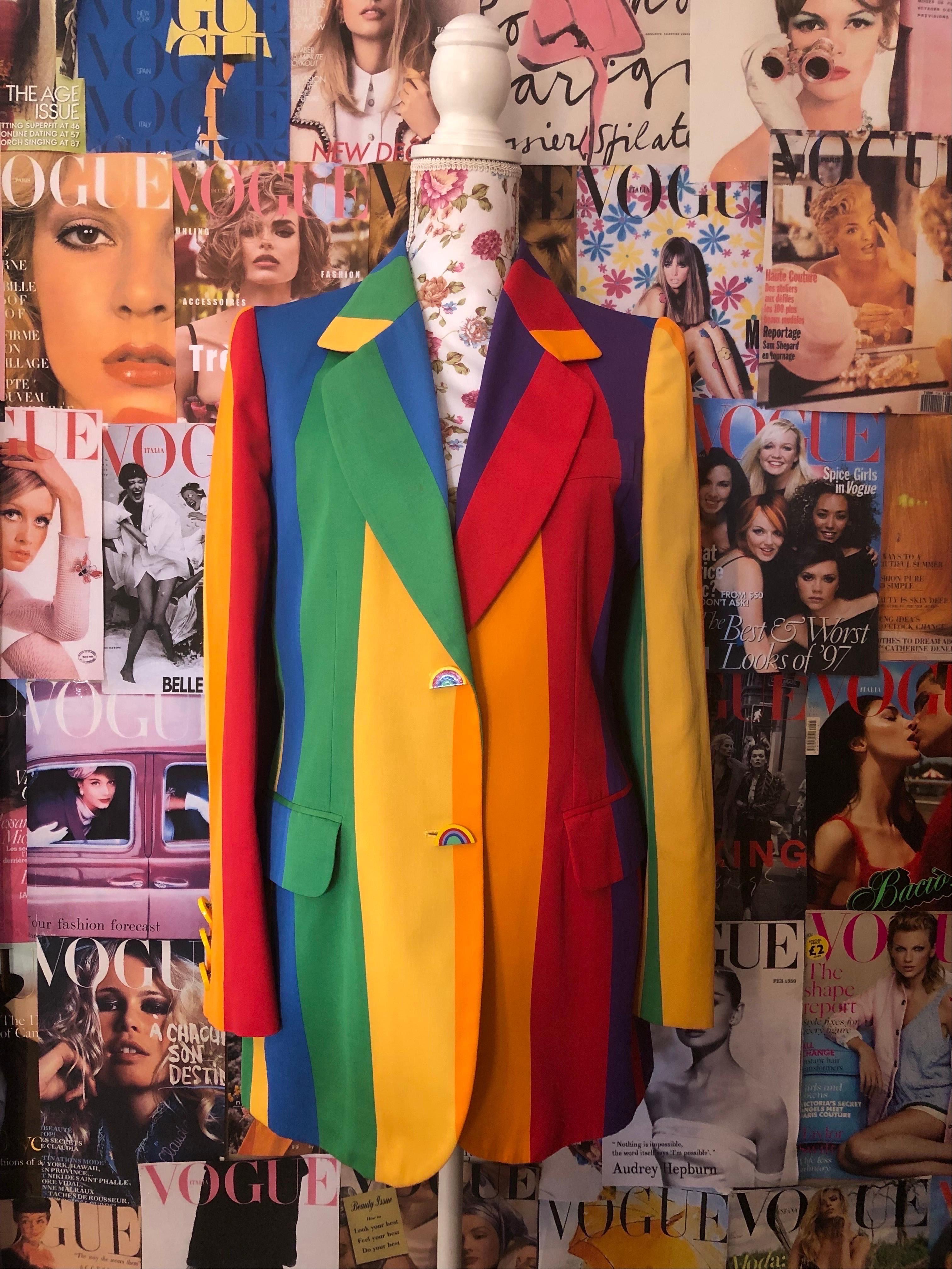 Vintage rainbow  blazer jacket by Moschino cheap & chic from 1990s era stripes pattern. There is  one minor stain In the back barely noticeable (see last photo) but in overall good condition given its age. This jacket is a Large size, it Can also be