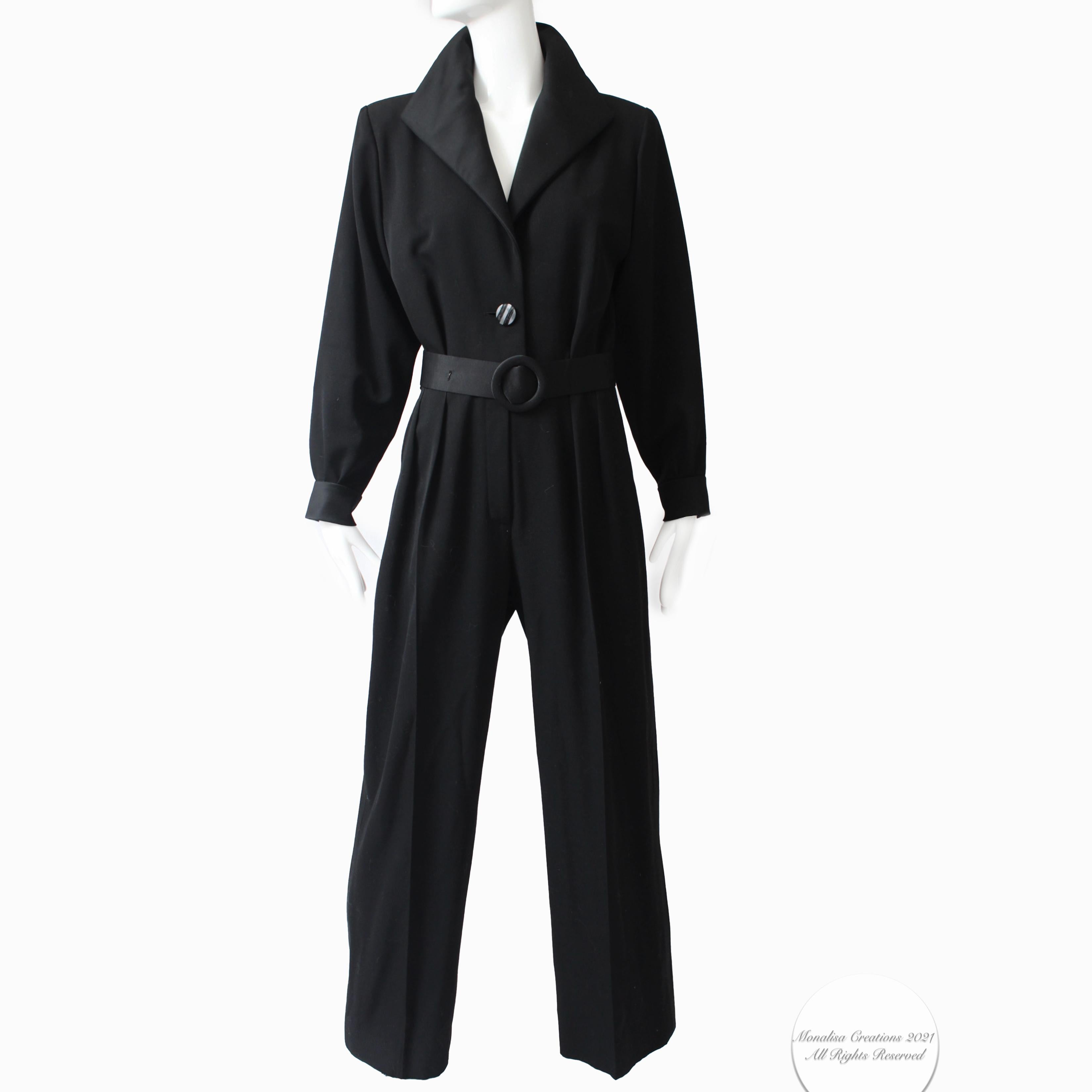This incredibly chic black jumpsuit was made by Yves Saint Laurent Rive Gauche, most likely in the early 1990s.  Made from wool with silk satin trim, it features YSL's iconic Le Smoking theme in a very sleek jumpsuit with a neckline that can be worn