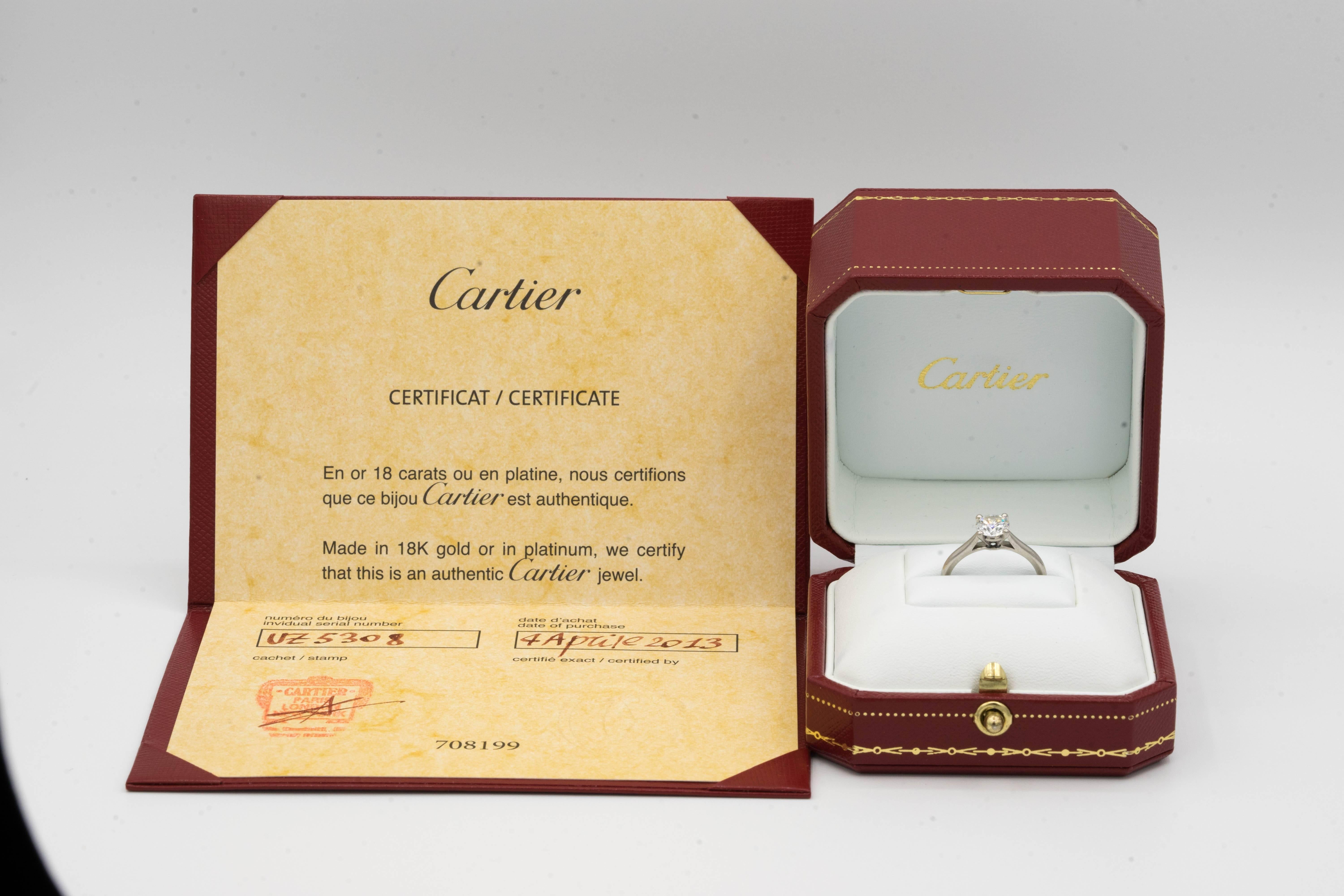 Contemporary .91 Carat Cartier Engagement Ring with Original Papers and Box