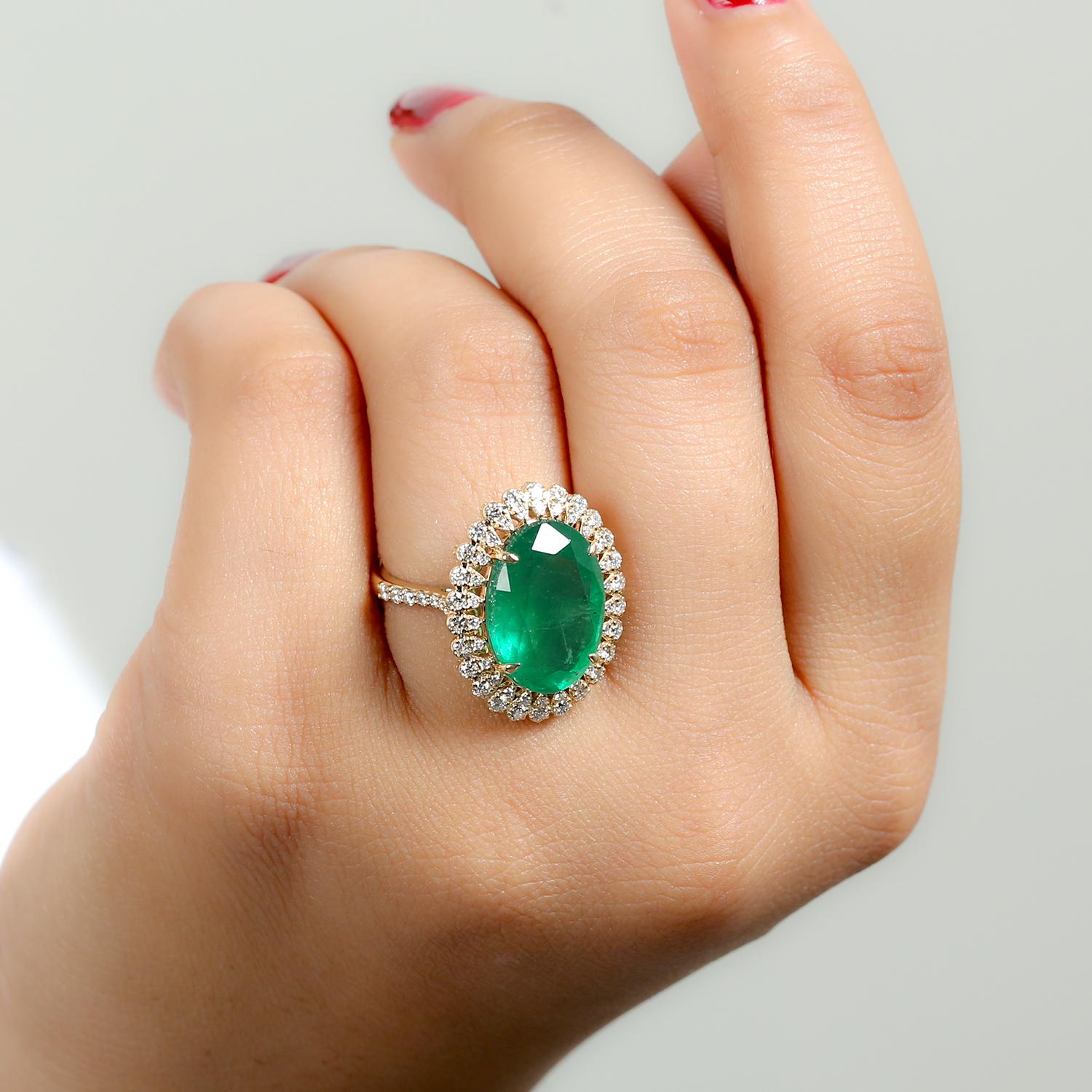 This ring has been meticulously crafted from 14-karat gold.  It is hand set with 9.1 carats emerald & .98 carats of sparkling diamonds. 

The ring is a size 7 and may be resized to larger or smaller upon request. 
FOLLOW  MEGHNA JEWELS storefront to