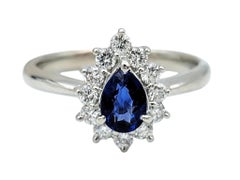Pear Cut Natural Blue Sapphire and Diamond Halo Ring in Platinum