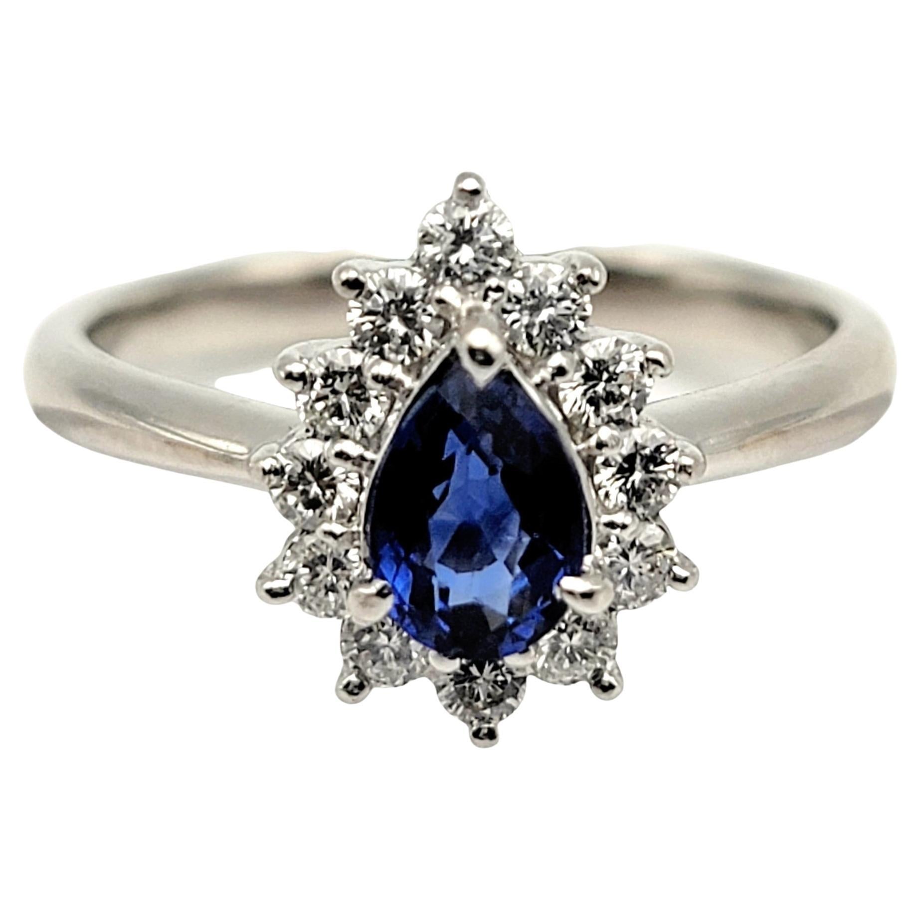 .91 Carats Total Natural Pear Cut Sapphire and Diamond Halo Platinum Ring For Sale