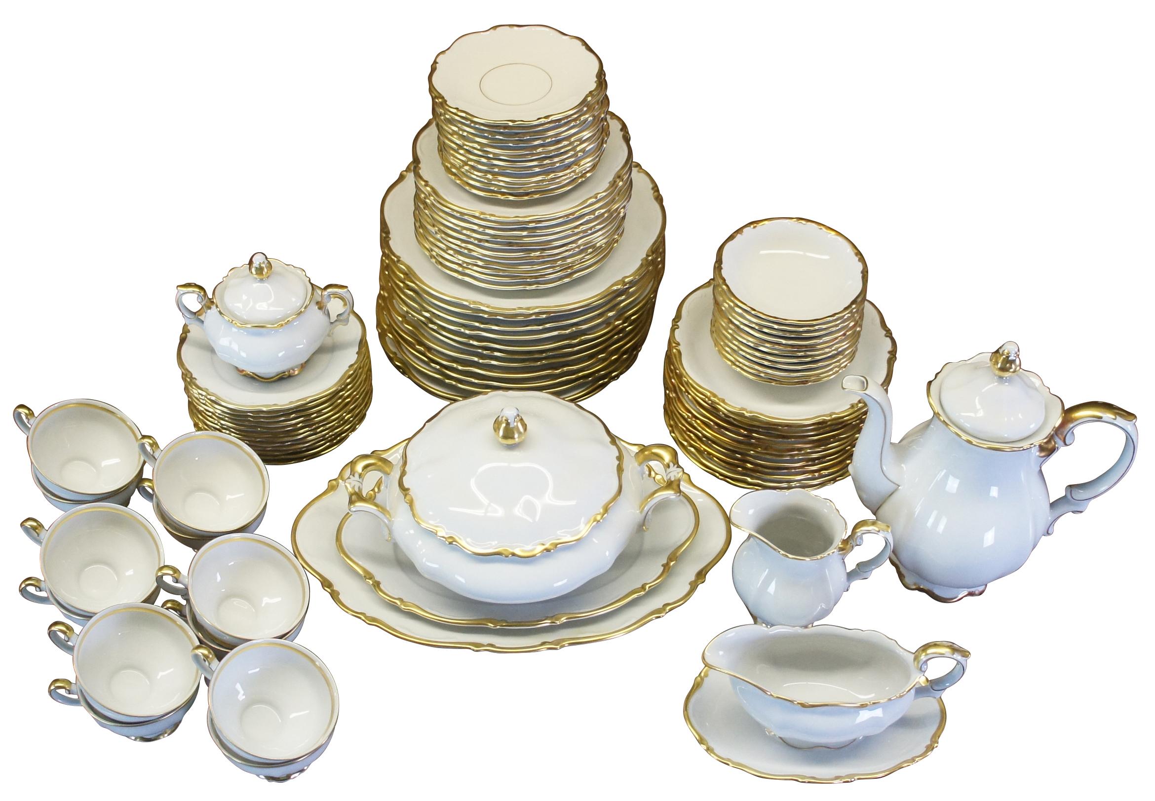 Vintage Mitterteich Bavaria Golden Lark china, tea and coffee dinner set featuring serpentine design with a classic white with gold pattern rim. Pattern 1507. Germany.

