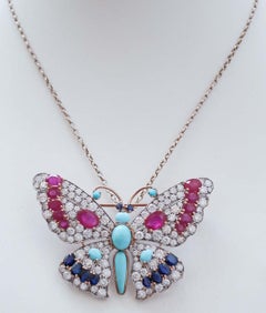 9.10 Ct Diamonds, Turquoise, Rubies, Sapphires, Rose Gold and Silver Brooch.