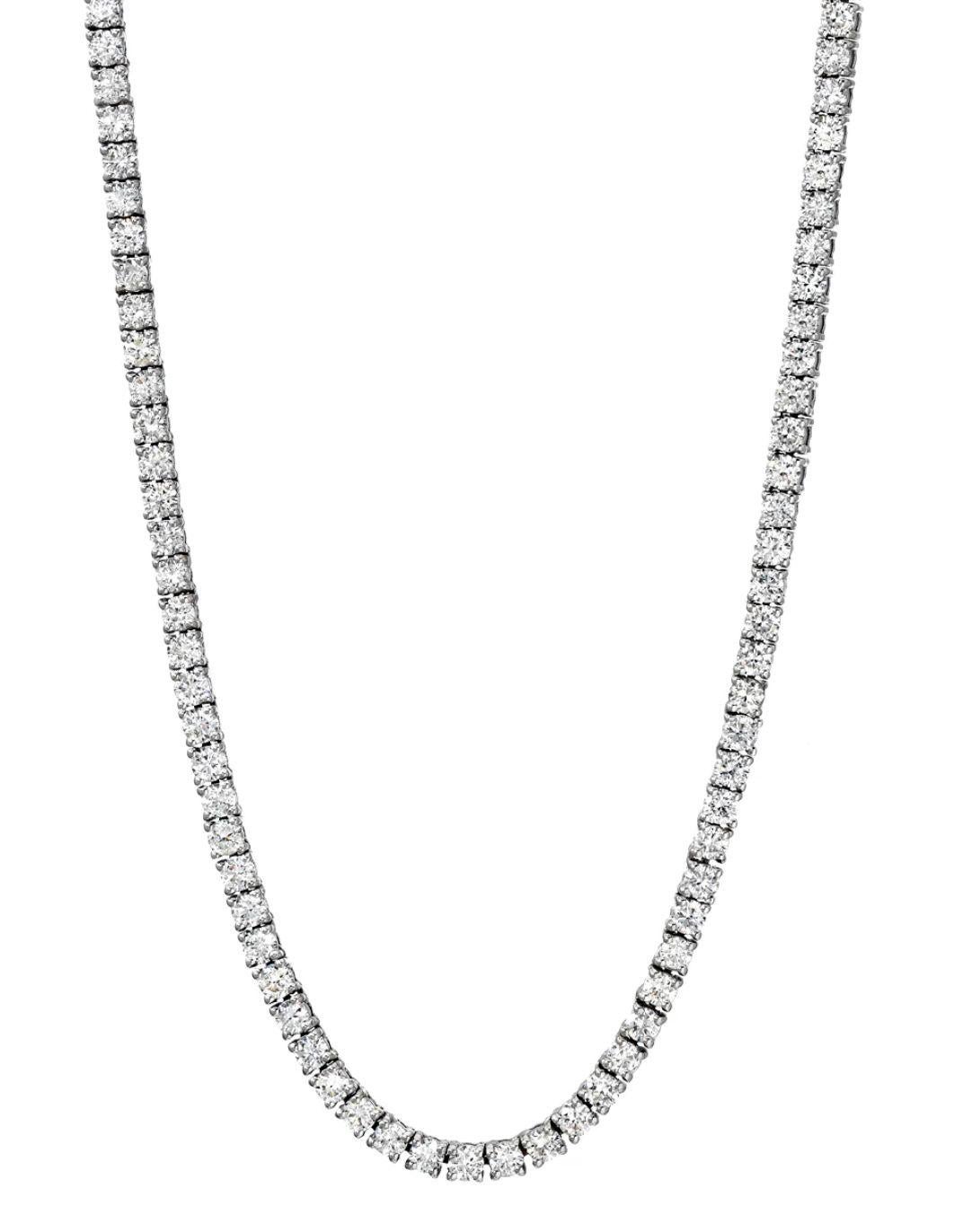 
An Amazing Estate Diamond 14k White gold (stamped) Tennis Necklace with 178 Round Brilliant Diamonds in G-H color, VS-SI clarity over all- eye clear. Each lovely round diamond is carefully set in 4 prongs. Estimated total weight of the diamonds is