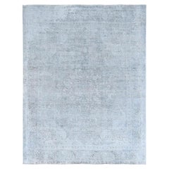 Alfombra azul de Tabriz, estilo «Old Farsian», de 9'10" x 12'2", tejida a mano con pelo corto y aspecto desgastado