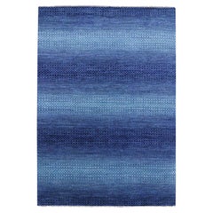 9
10 "x14
Bleu denim, Collection moderne Chiaroscuro, Tapis en pure laine noué à la main