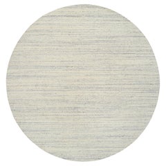 Tappeto rotondo 9'10 "x9'10" in lana beige lavorato a mano con trama variegata dal design moderno