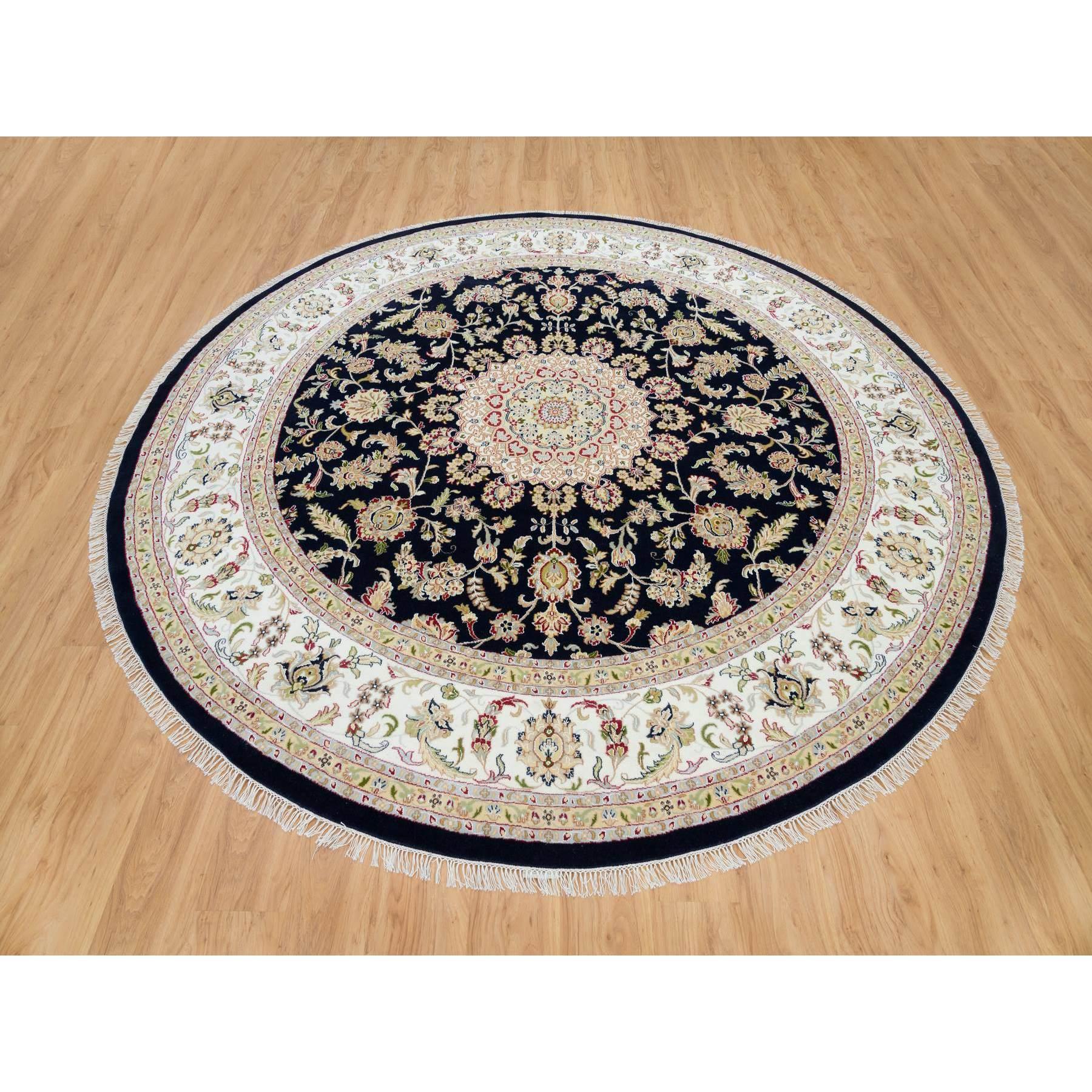 Midnight Blue, 250 KPSI, Extra Soft Wool, Hand Knotted, Nain with Center Medallion Flower Design, Round Oriental Rug
Primary materials: Wool
Latex: No Pile 
height: 0.25 Inches
Style: Traditional
Primary color: Blue
Secondary colors: Red, Light
