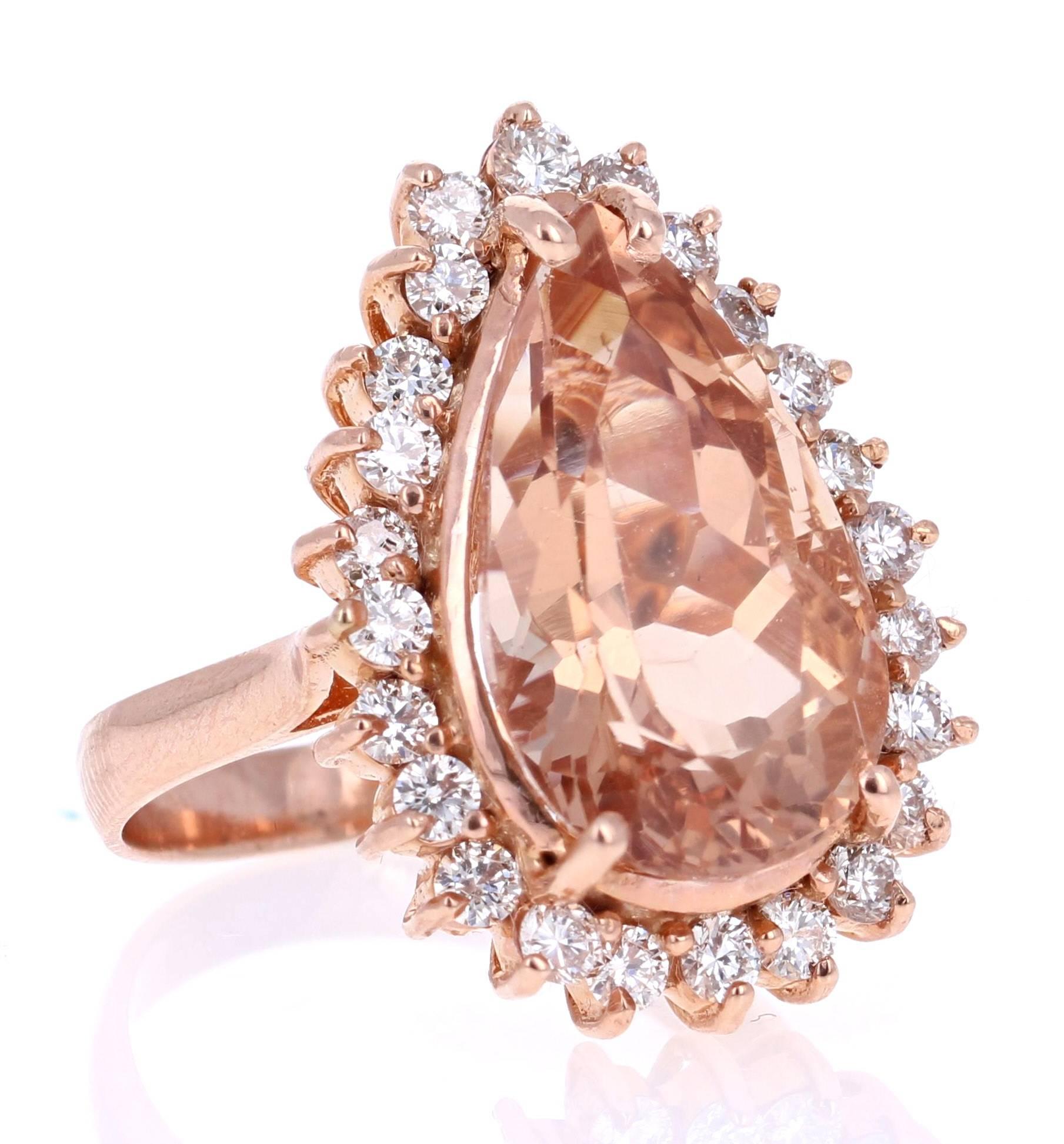 Beautiful and eye-catching 9.15 Carat Pear Cut Morganite Diamond Rose Gold Cocktail Ring!

This ring has a large 8.17 carat Pear Cut Morganite in the center of the ring and is surrounded by 24 Round Cut Diamonds that weigh 0.98 carats.   The total