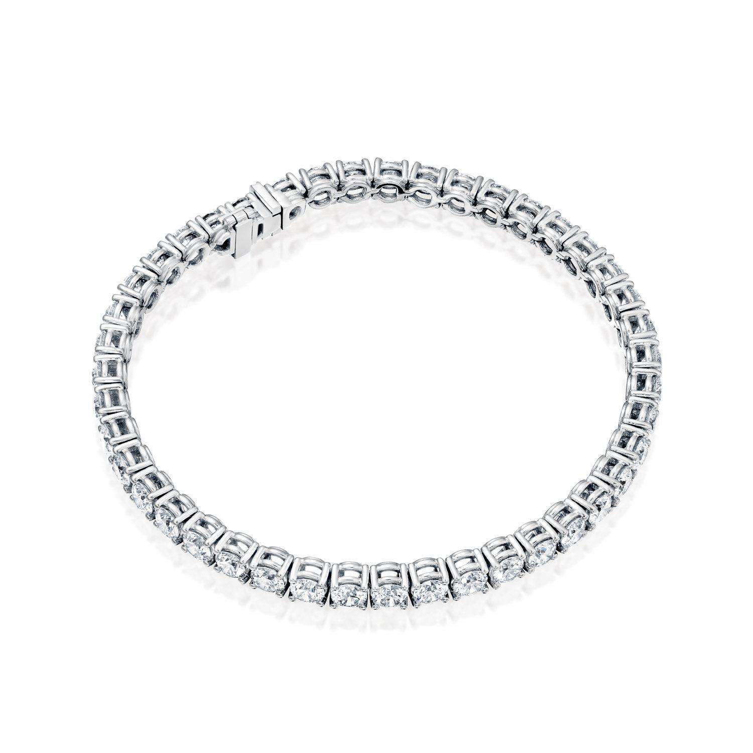 A beautiful large and classic diamond bracelet made of 14K White Gold set with 43 Diamonds. The total carat weight of this beautiful Diamond bracelet is 9.15 carat.
 
Metal Type: 
This bracelet can be made in yellow gold, white gold or rose gold