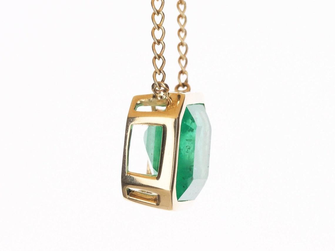 Modern 9.15tcw 14K Colombian Emerald-Emerald Cut Solitaire Diamond Accent Pendant For Sale