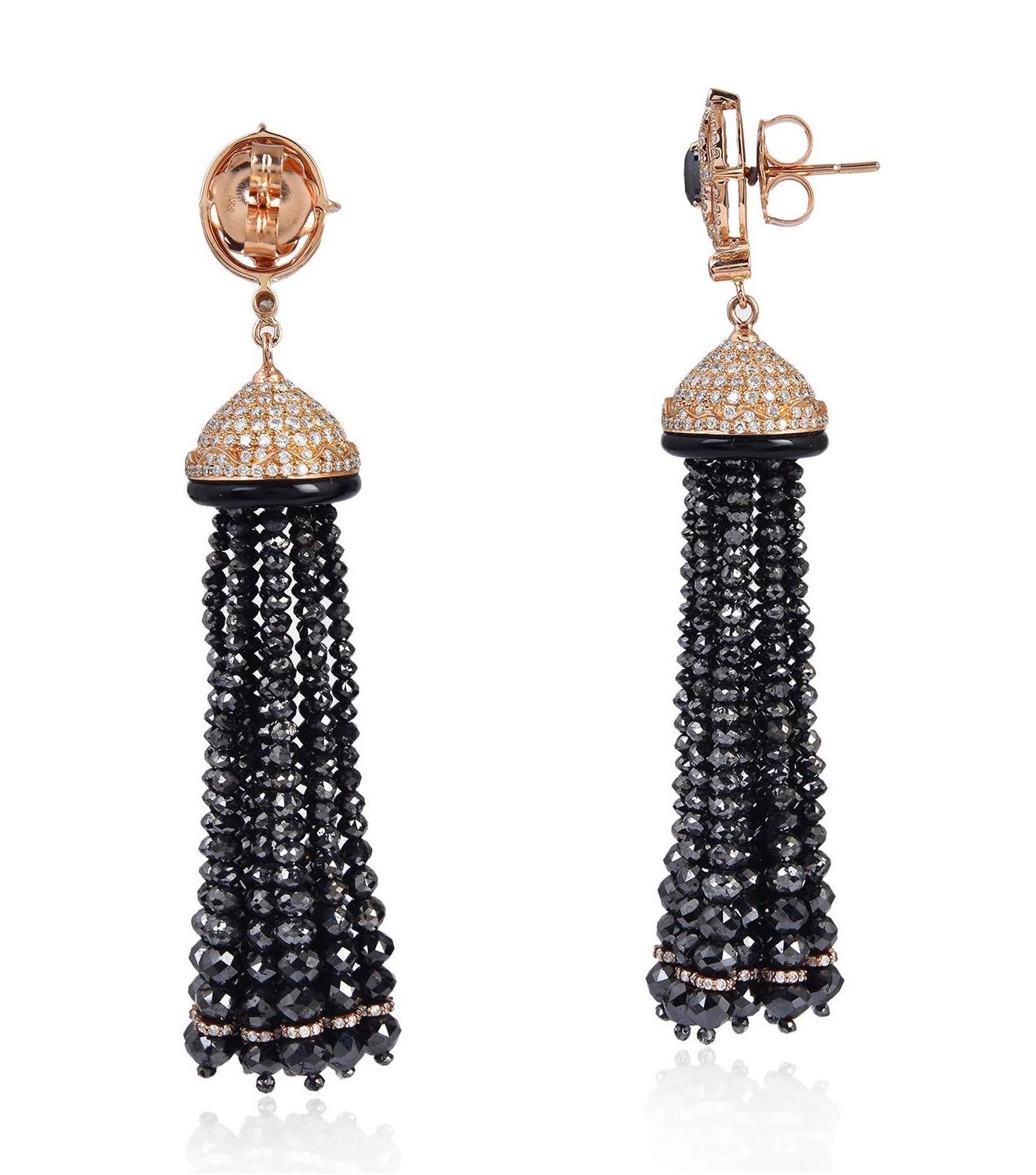 These stunning tassel earrings are handmade in 18-karat gold.  It is set in 2.94 carats onyx, 91.68 carats fancy and pave diamonds. 

FOLLOW  MEGHNA JEWELS storefront to view the latest collection & exclusive pieces.  Meghna Jewels is proudly rated