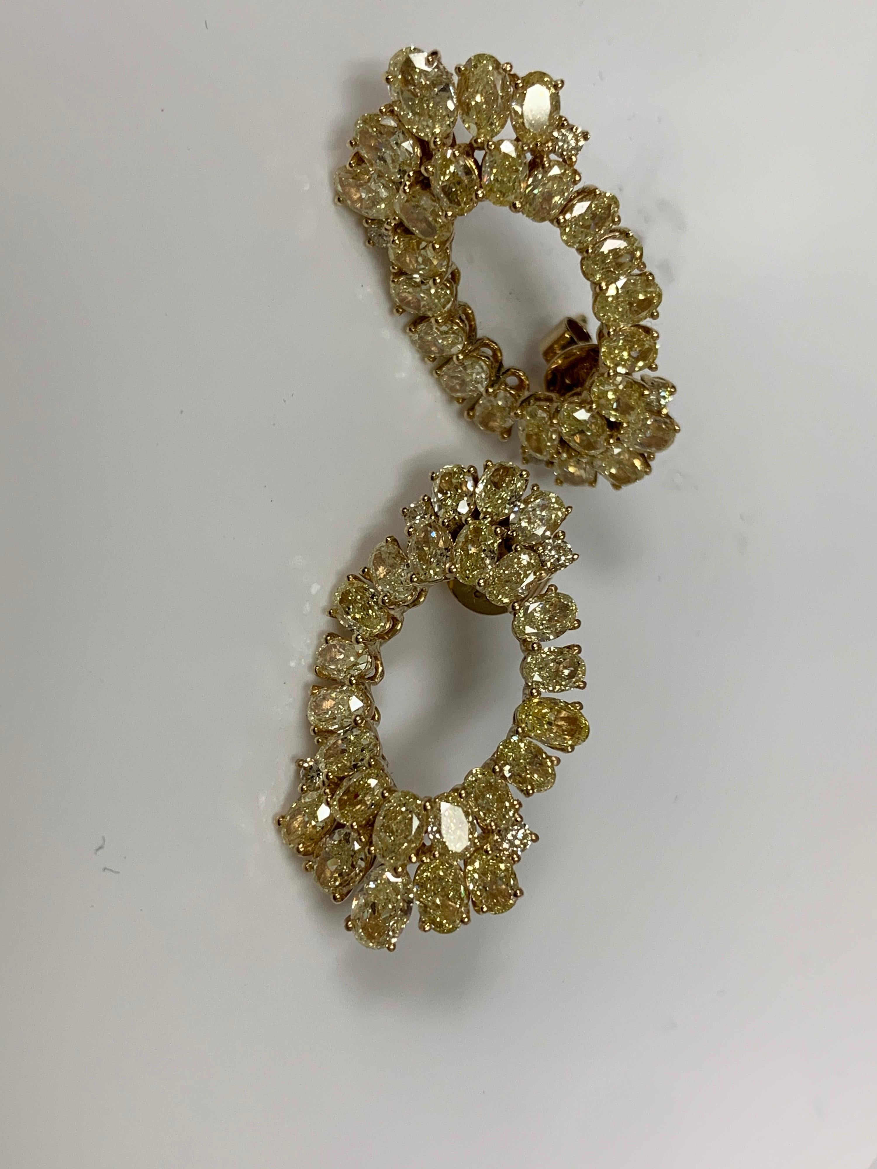 Oval Cut 9.17 Carat Yellow Diamond Earrings For Sale