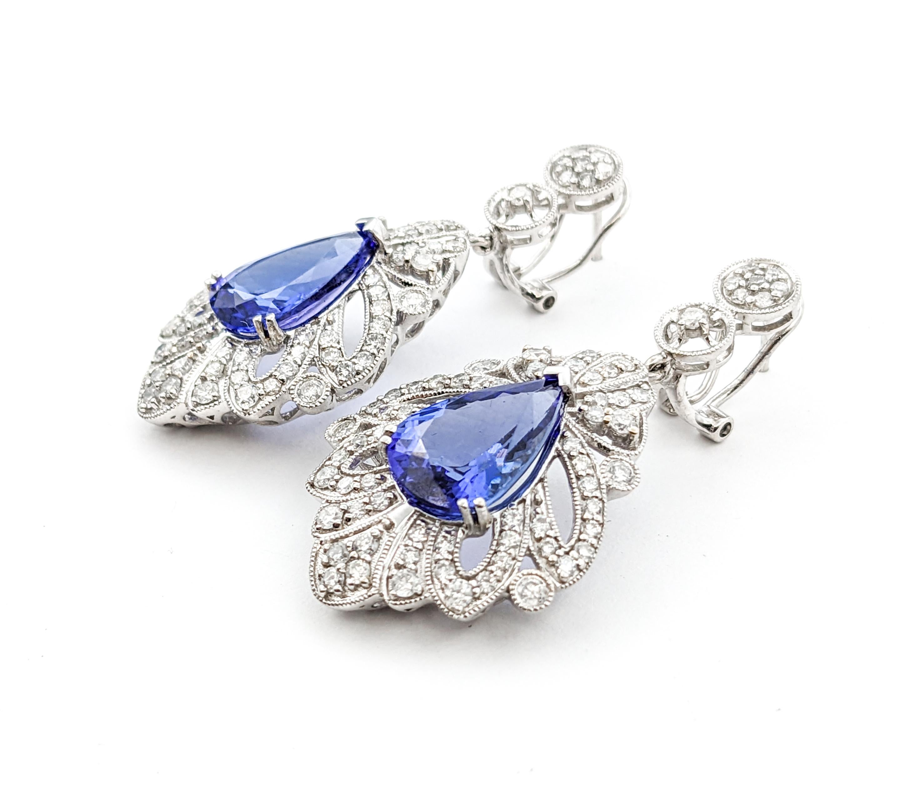 9.17ctw Tanzanite & 2.34ctw Diamond Dangle Earrings In White Gold

Introducing these exquisite Tanzanite Dangle Earrings, crafted in bright 18K White Gold, a true embodiment of elegance and craftsmanship. Enhanced by a generous weight of 9.17 carats