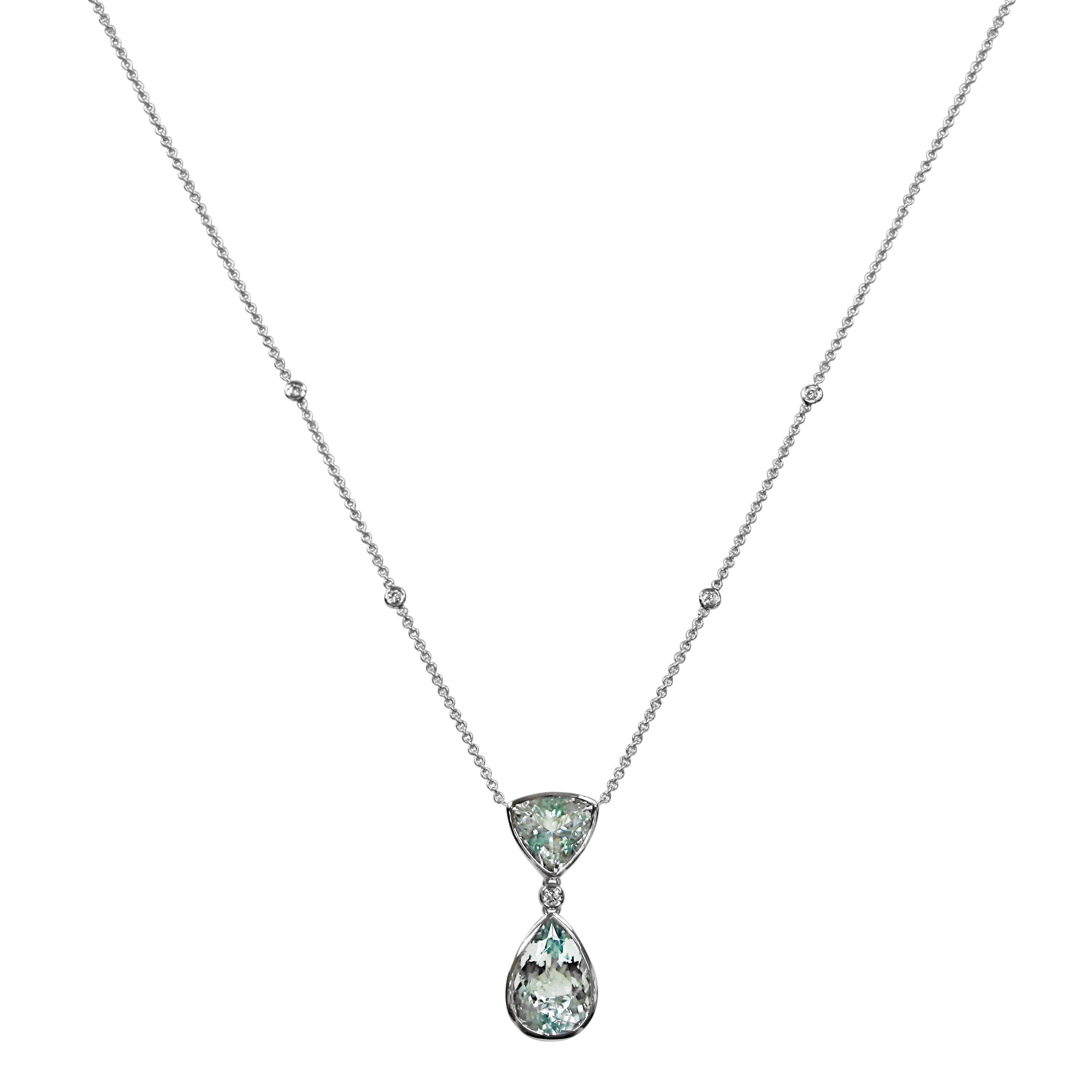 2 Aquamarine Gemstones: 9.04 Carats
5 White Diamonds: 0.14 Carat
Metal: 18K White Gold, 6 Grams
