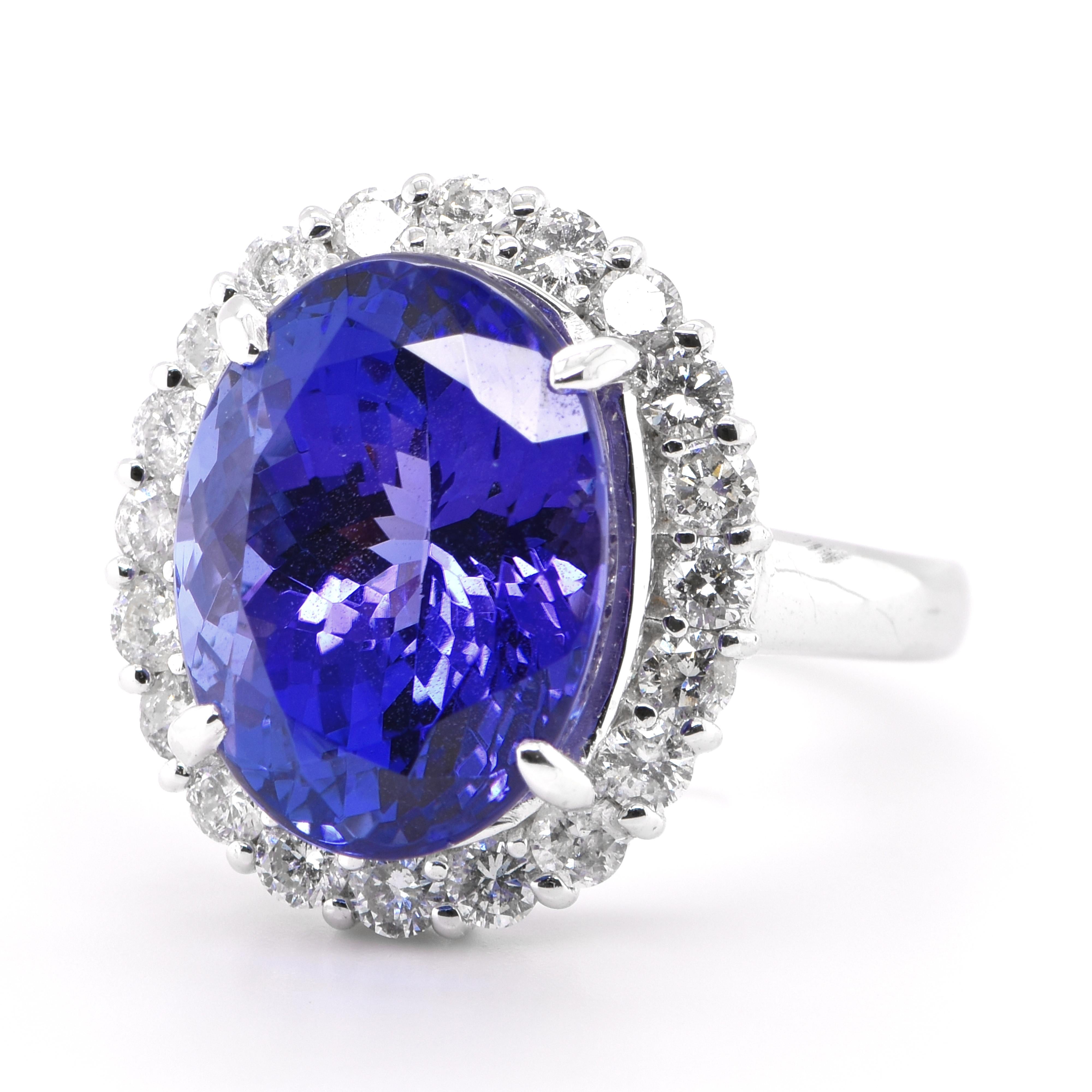 A beautiful Cocktail Ring featuring a 9.19 Carat Natural Tanzanite and 0.84 Carats of Diamond Accents set in Platinum. Tanzanite's name was given by Tiffany and Co after its only known source: Tanzania. Tanzanite displays beautiful pleochroic colors