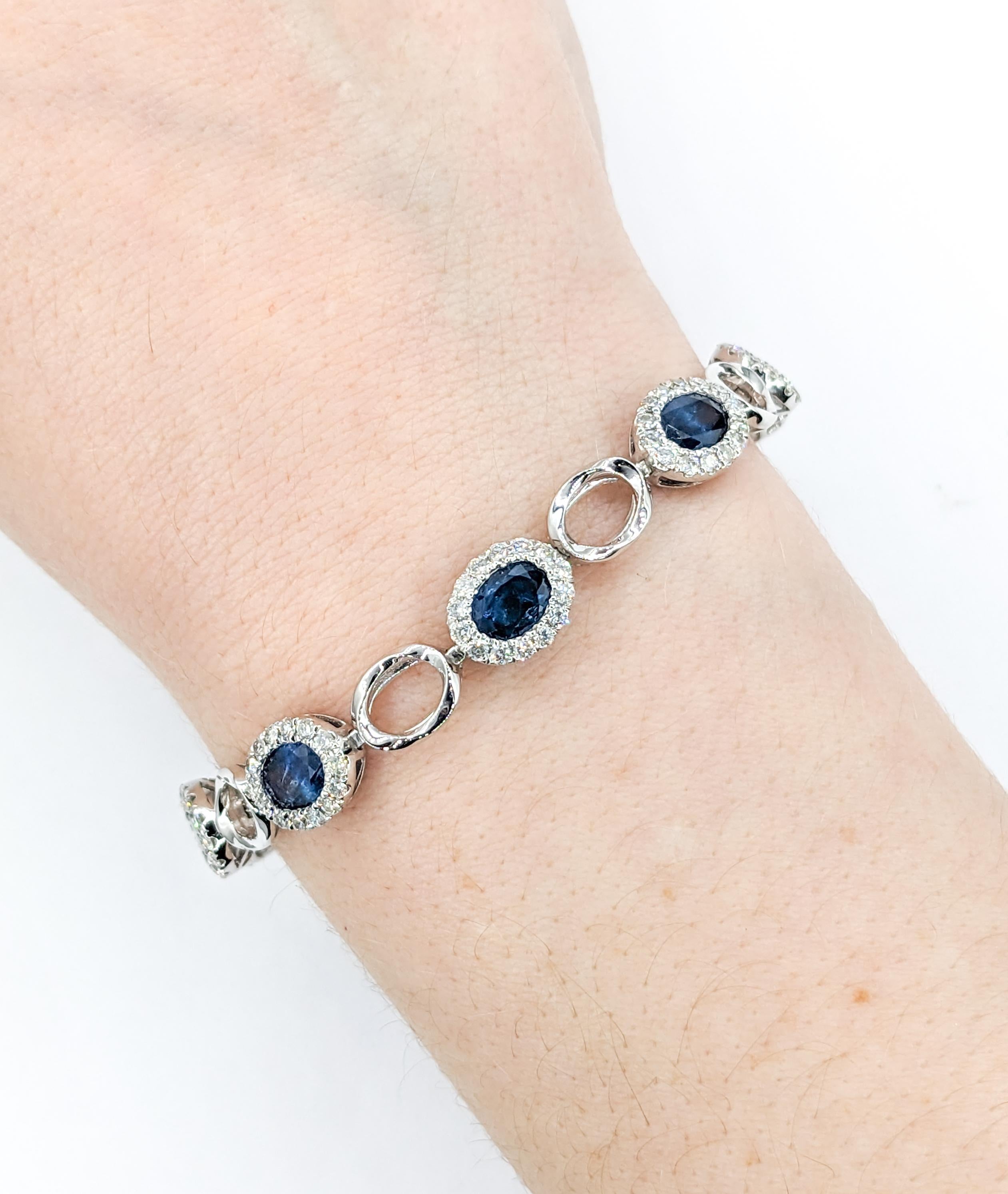 9.19ctw of Sapphires & 1.89ctw Diamond Bracelet In Platinum

Introducing an exquisite Sapphire Bracelet, masterfully crafted in bright Platinum. This luxurious bracelet is adorned with 9.19ctw of oval cut deep blue Sapphires. Adorning the sapphires