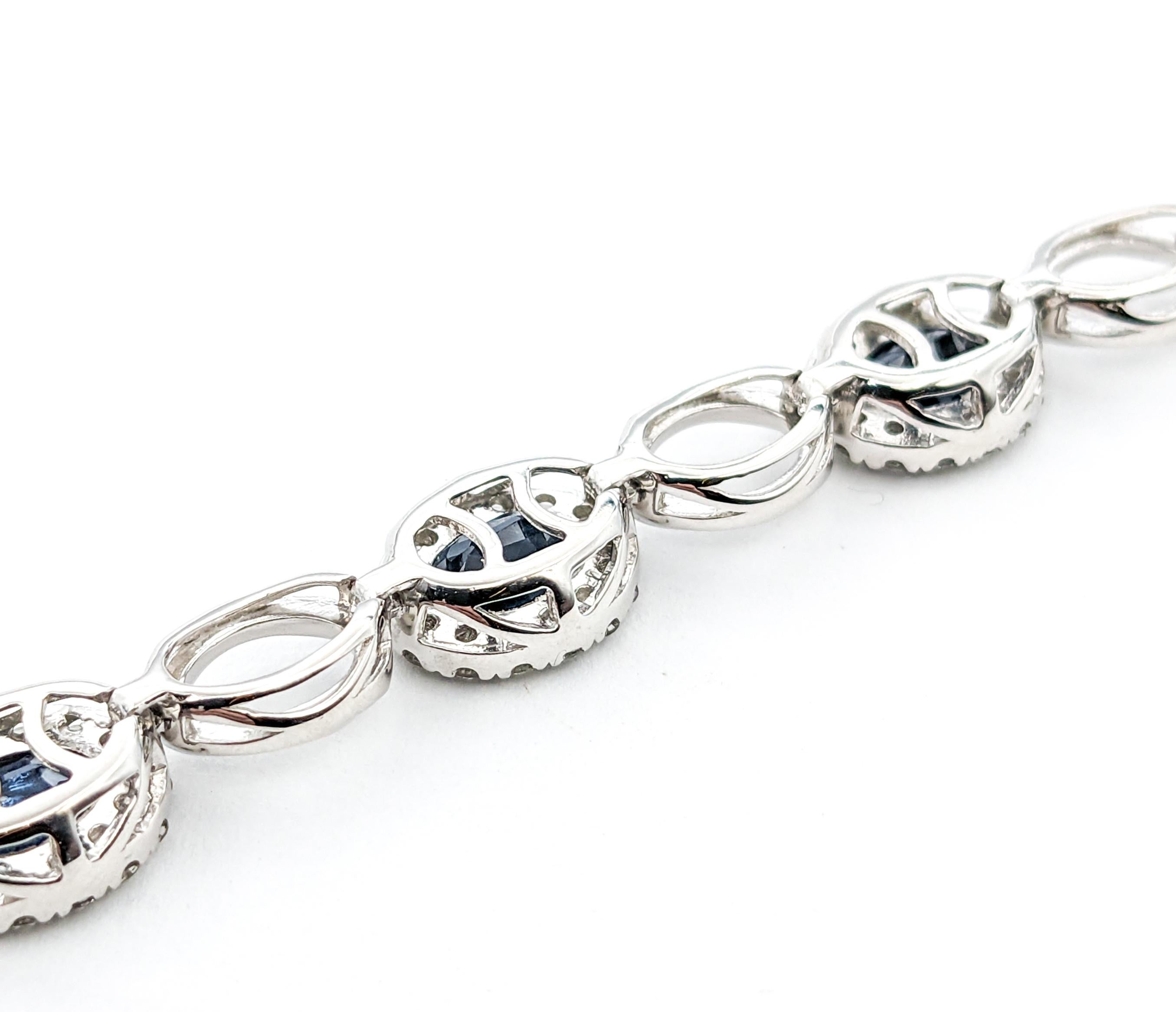 Oval Cut 9.19ctw of Sapphires & 1.89ctw Diamond Bracelet In Platinum For Sale