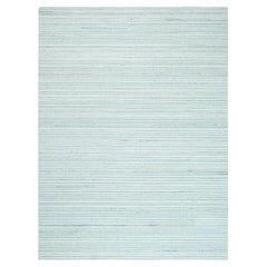 Tappeto 9
1 "x12
dal design moderno in lana naturale tessuta a mano avorio e blu