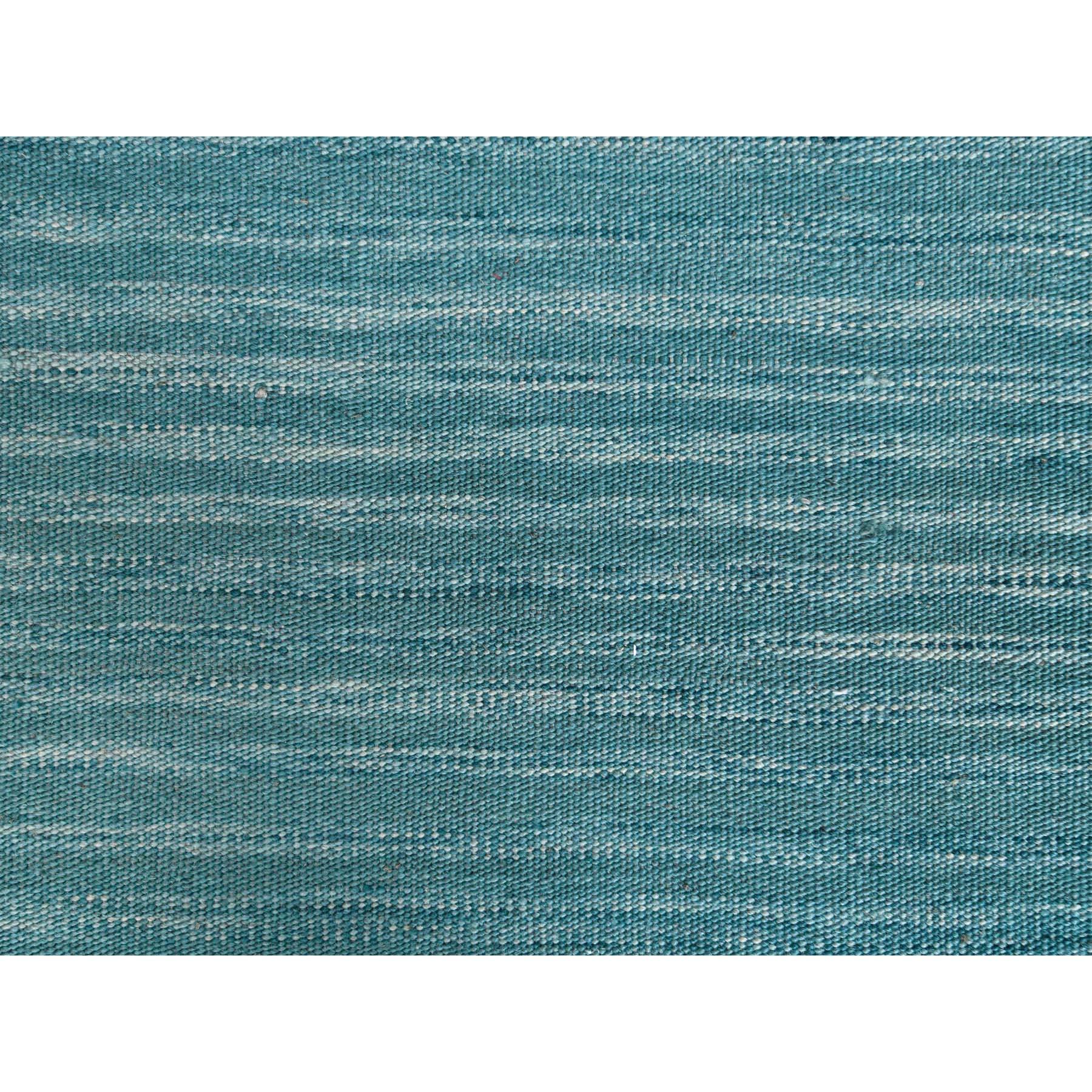 This is a truly genuine one-of-a-kind THE AQUAMARINE Hand Woven Flat Weave Kilim Natural Wool Reversible Oriental Rug. It has been Woven for months and months in the centuries-old weaving craftsmanship techniques by expert artisans.
Primary