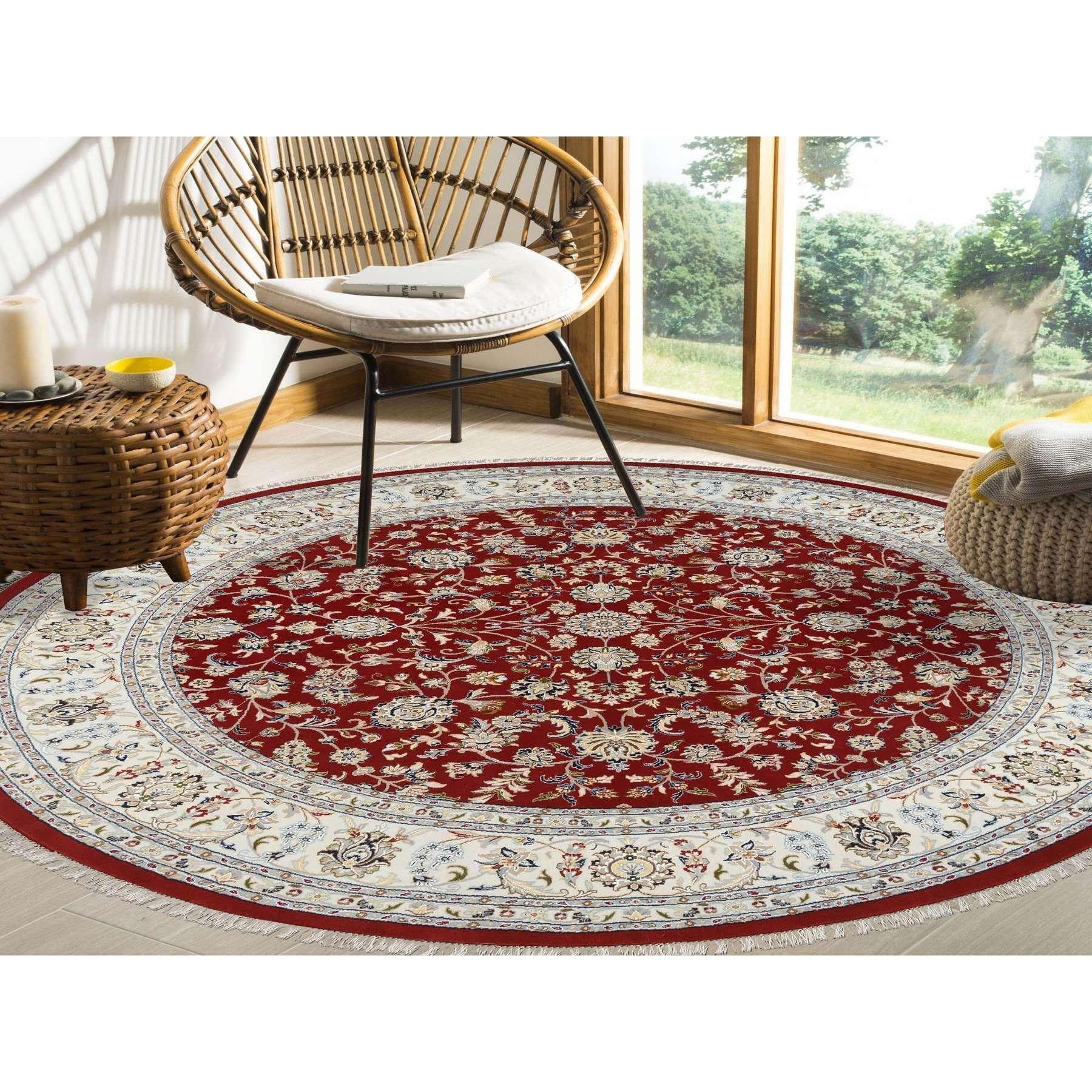 This is a truly genuine one-of-a-kind Cherry Red, Hand Knotted Nain with All Over Flower Design, 250 KPSI Wool, Round Oriental Rug. It has been Knotted for months and months in the centuries-old weaving craftsmanship techniques by expert