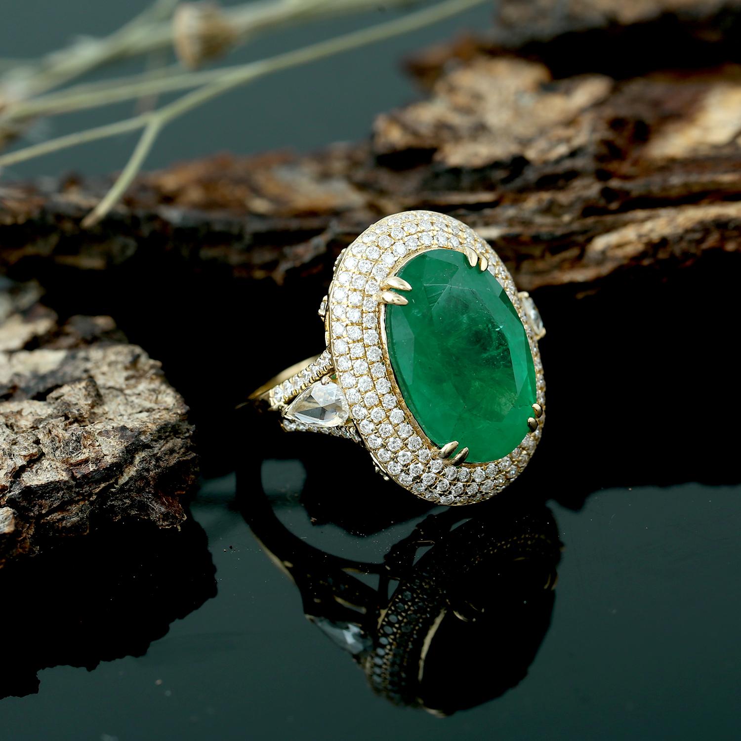 This ring has been meticulously crafted from 14-karat gold.  It is hand set with 9.2 carats emerald & 1.19 carats of sparkling diamonds. 

The ring is a size 7 and may be resized to larger or smaller upon request. 
FOLLOW  MEGHNA JEWELS storefront