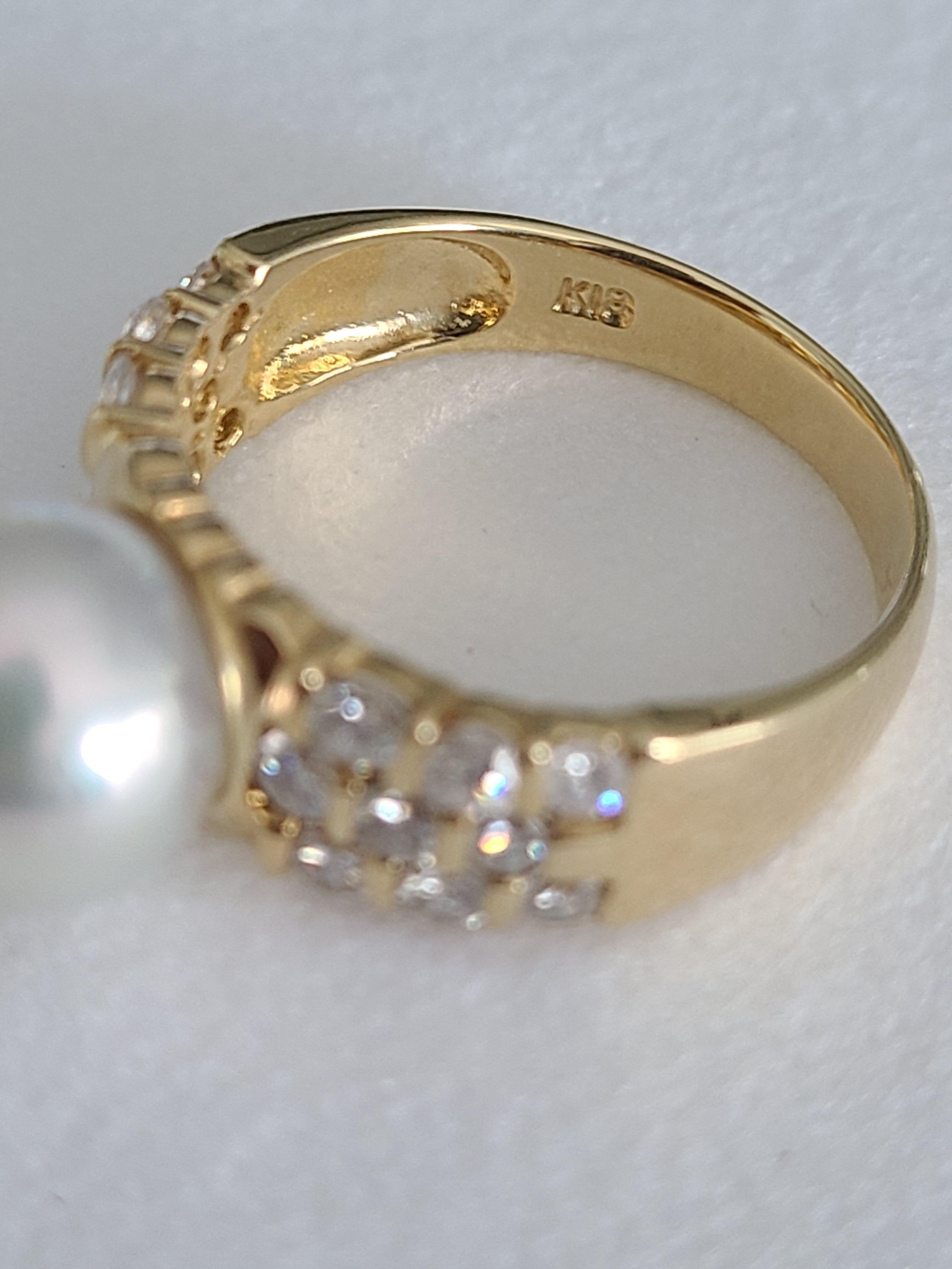 Perlenring aus 18 Karat Gold mit Diamanten 1