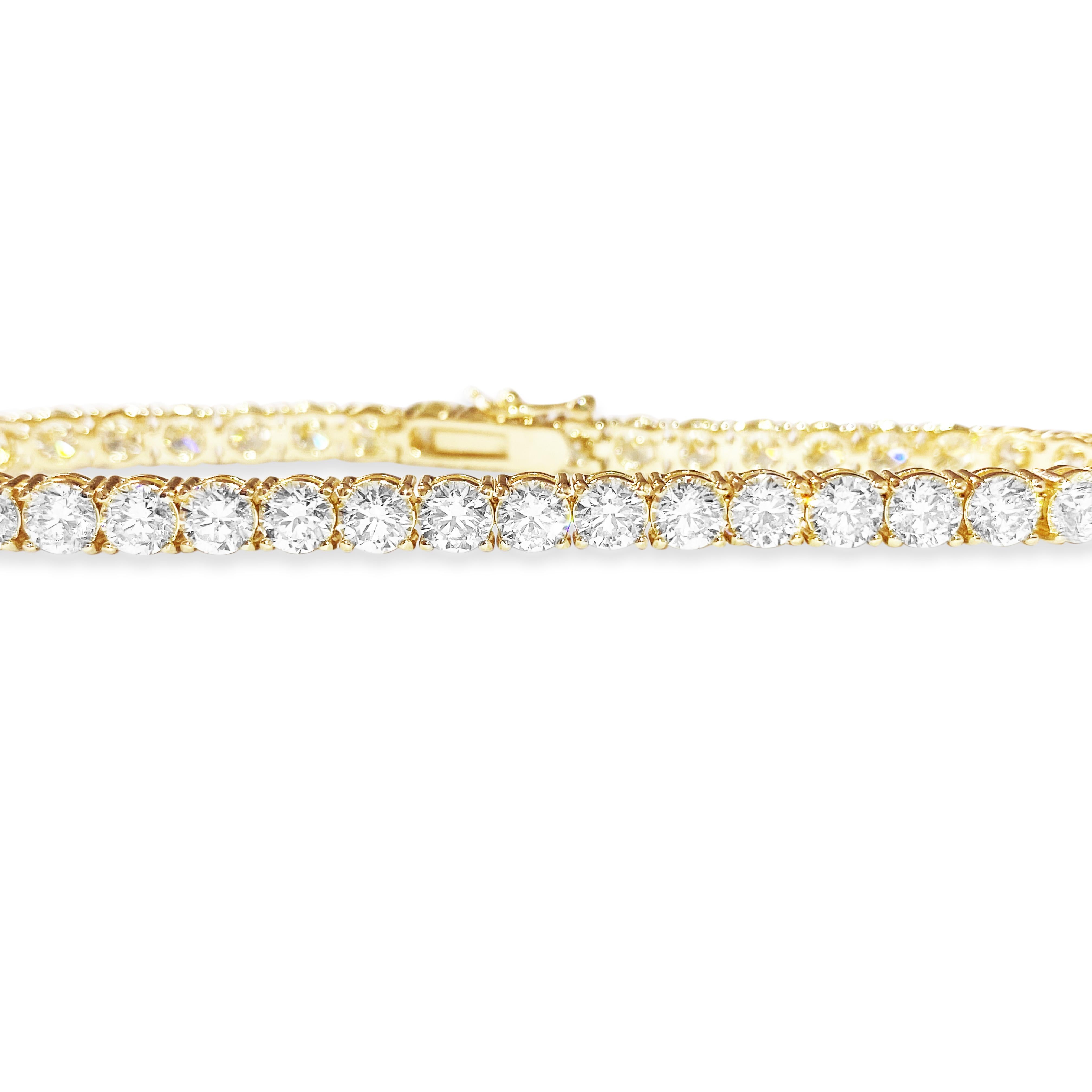 Step into elegance with our exquisite Diamond Tennis Bracelet, crafted from radiant yellow gold. Adorned with a stunning array of round brilliant cut diamonds, each boasting VVS clarity, this bracelet is a timeless symbol of luxury. Perfect for