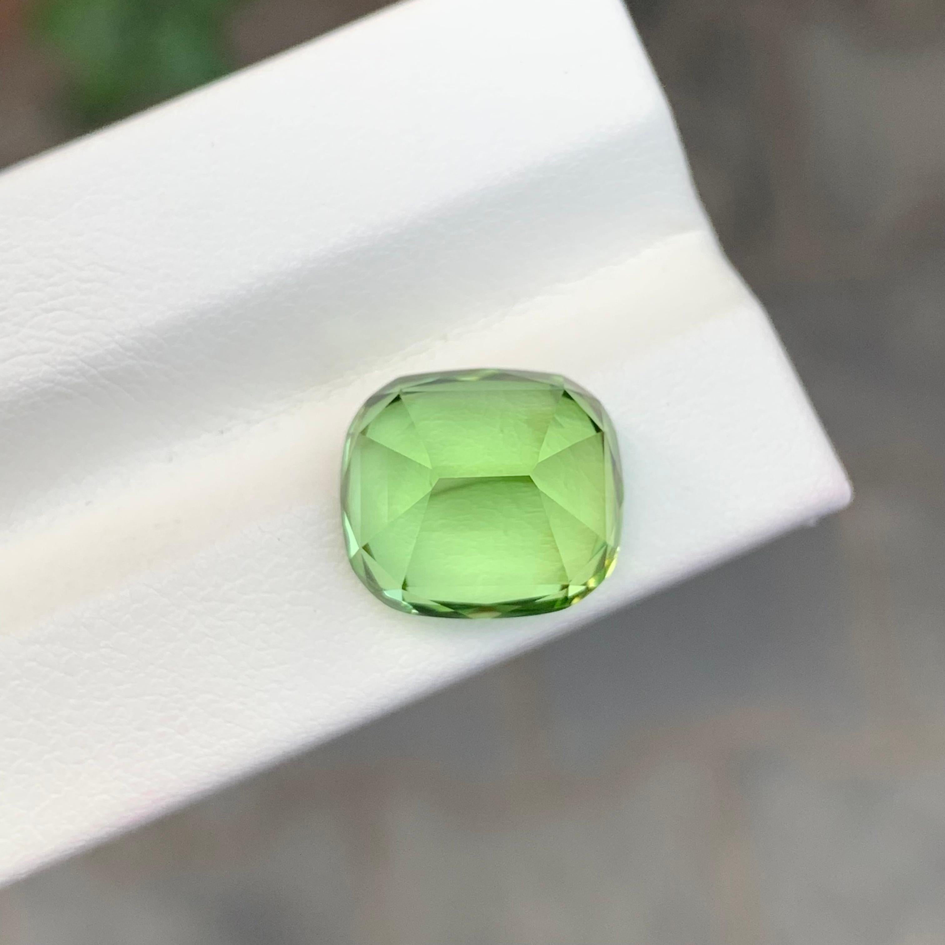 Women's or Men's 9.20 Carat Natural Loose Lightsaber Green Peridot Cushion Shape Gem For Sale