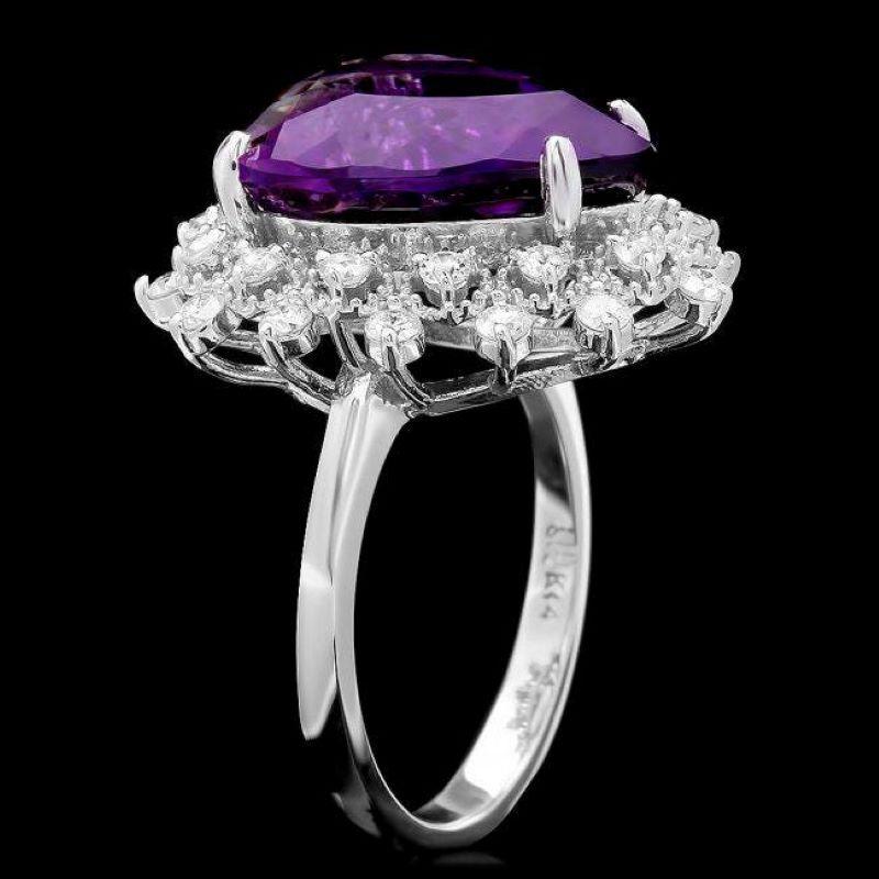 9.20 Carats Natural Amethyst and Diamond 14K Solid White Gold Ring

Total Natural Amethyst Weights: Approx. 8.40 Carats

Amethyst Measures: Approx. 16.00 x 13.00mm

Natural Round Diamonds Weight: Approx. 0.80 Carats (color G-H / Clarity SI1-2)

Ring