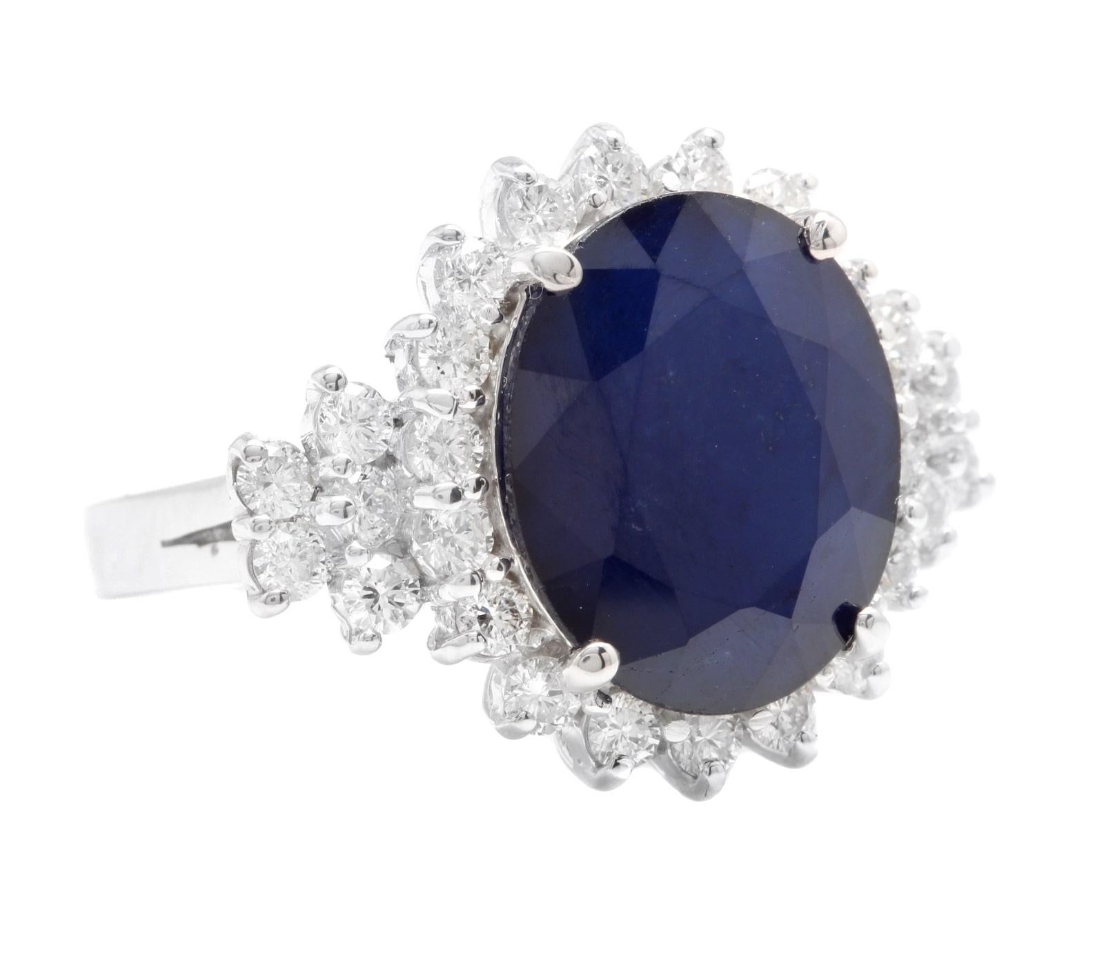 9.20 Carats Exquisite Natural Blue Sapphire and Diamond 14K Solid White Gold Ring

Suggested Replacement Value $6,500.00

Total Blue Sapphire Weight is: Approx. 8.00 Carats (Treated)

Sapphire Measures: 14.50 x 12.00mm

Natural Round Diamonds