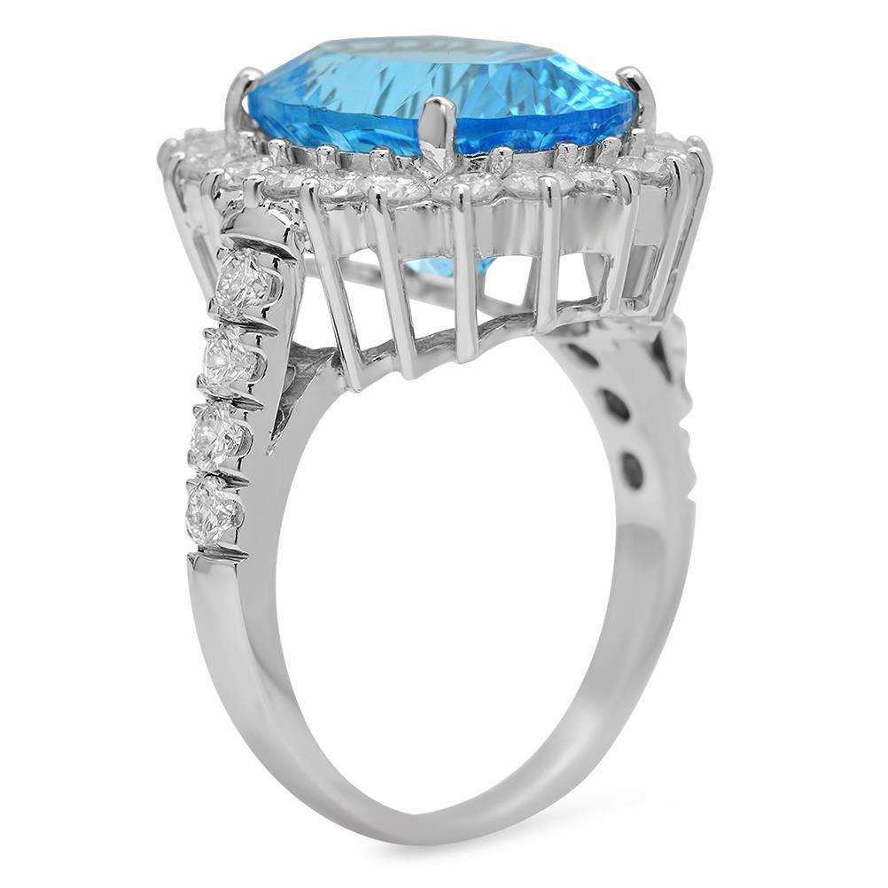9.20 Carats Natural Blue Topaz and Diamond 14K Solid White Gold Ring

Total Natural Blue Topaz Weight is: Approx. 7.80 Carats 

Blue Topaz Measures: Approx. 14.00 x 11.00mm

Natural Round Diamonds Weight: Approx. 1.40 Carats (color G-H / Clarity