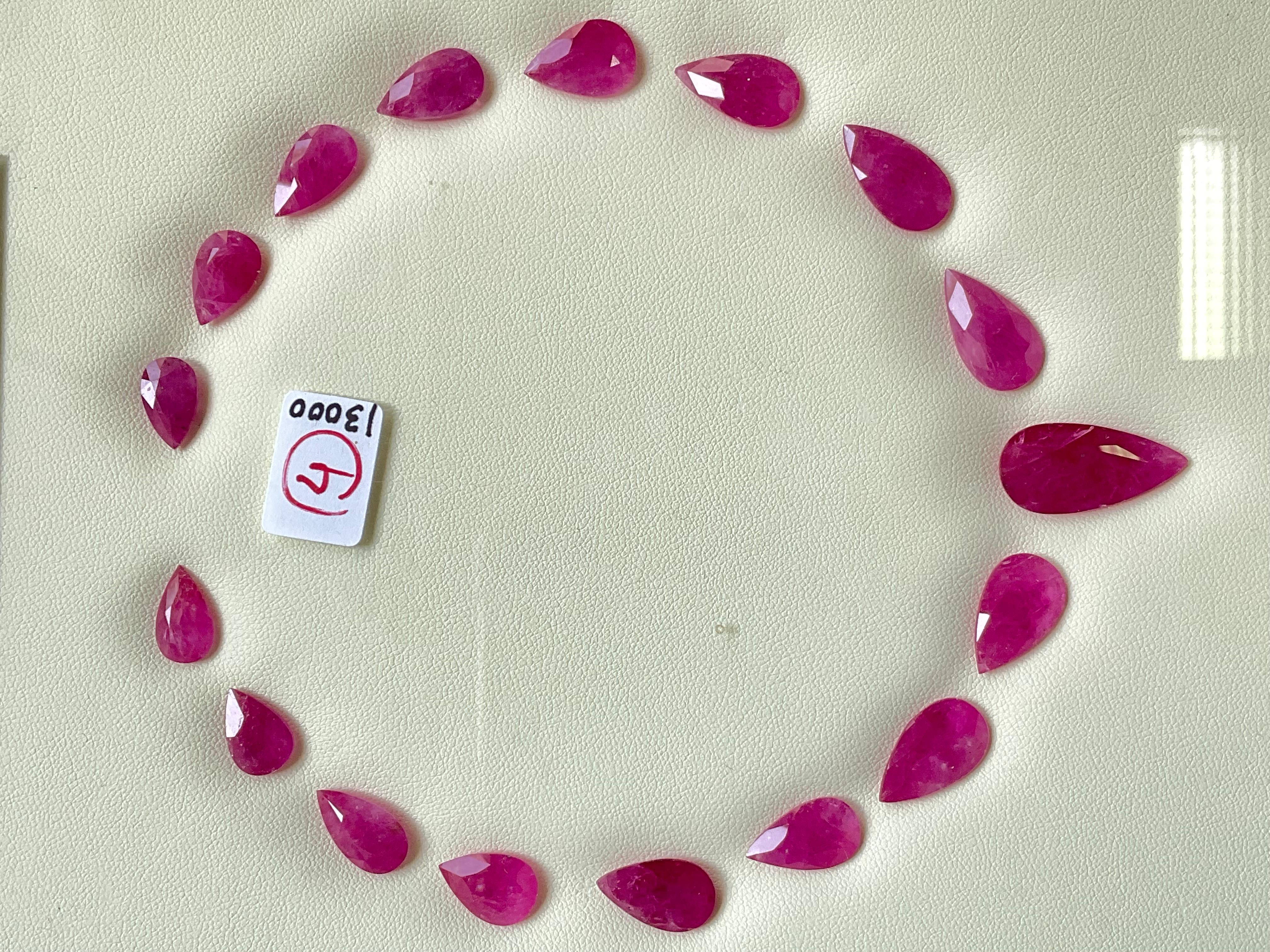 Pear Cut 92.09 carats ruby Mozambique cut stone pear 17 Pieces layout heated natural gem For Sale