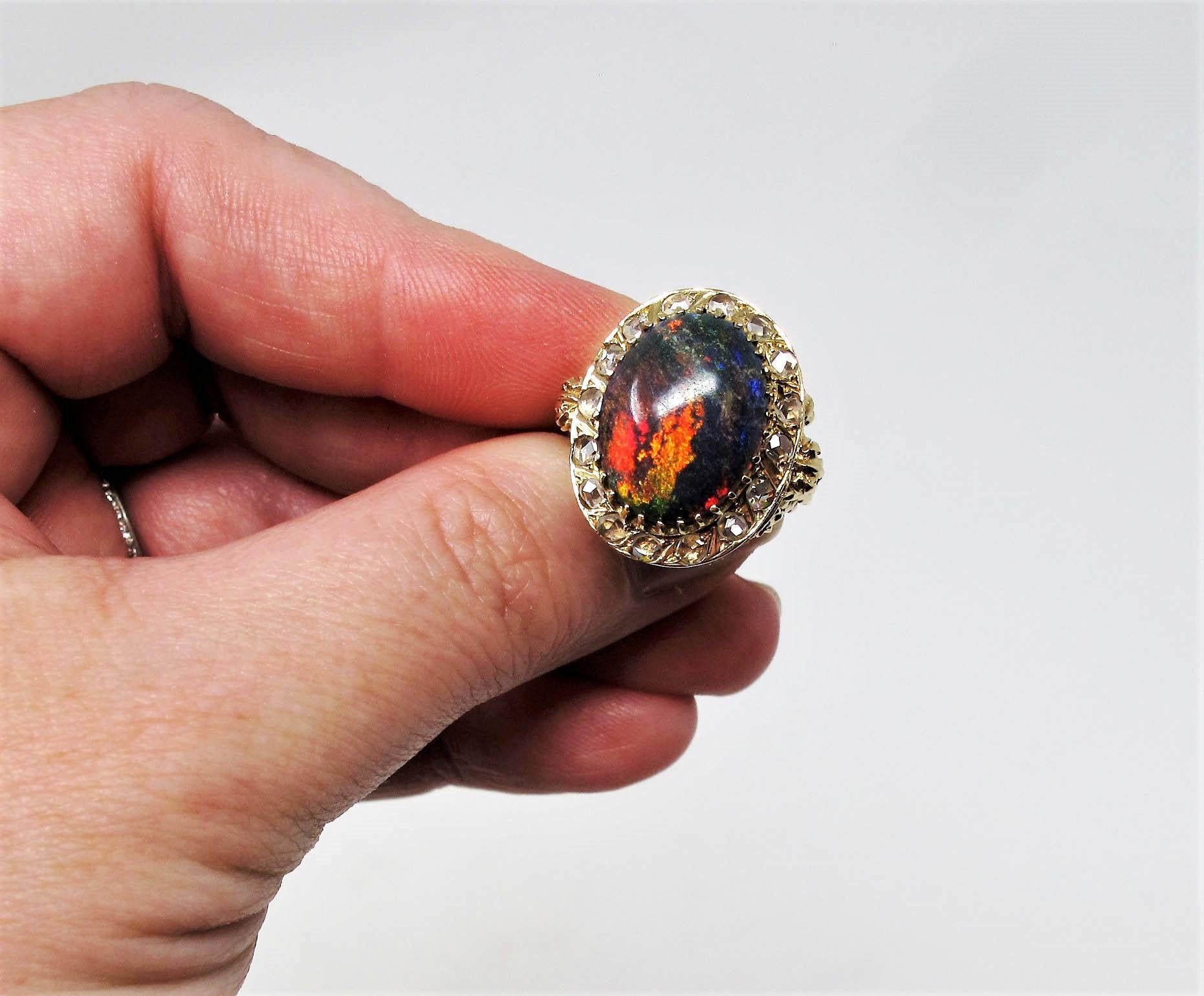 9.21 Carat Oval Cabochon Black Opal and Diamond Halo Cocktail Ring 14 Karat Gold For Sale 3