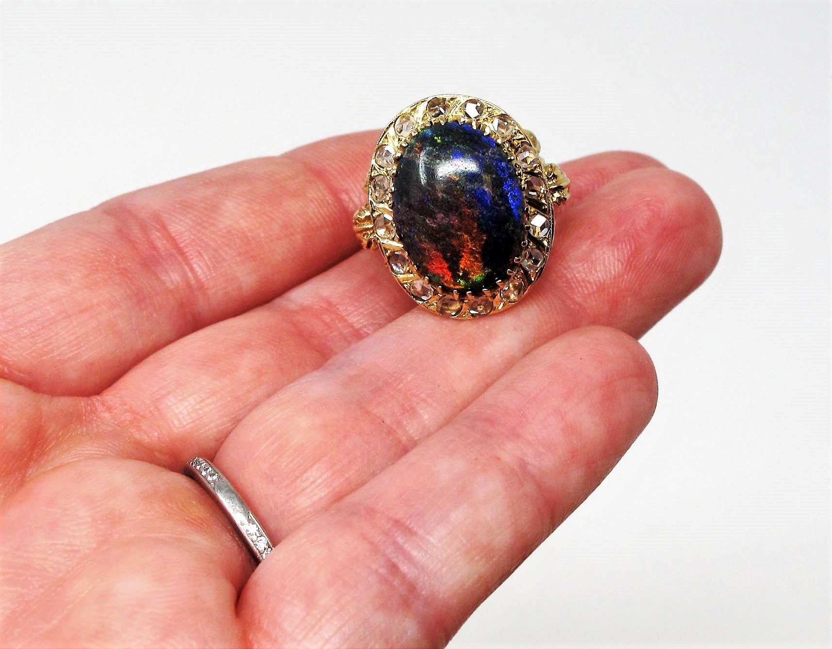 9.21 Carat Oval Cabochon Black Opal and Diamond Halo Cocktail Ring 14 Karat Gold For Sale 4