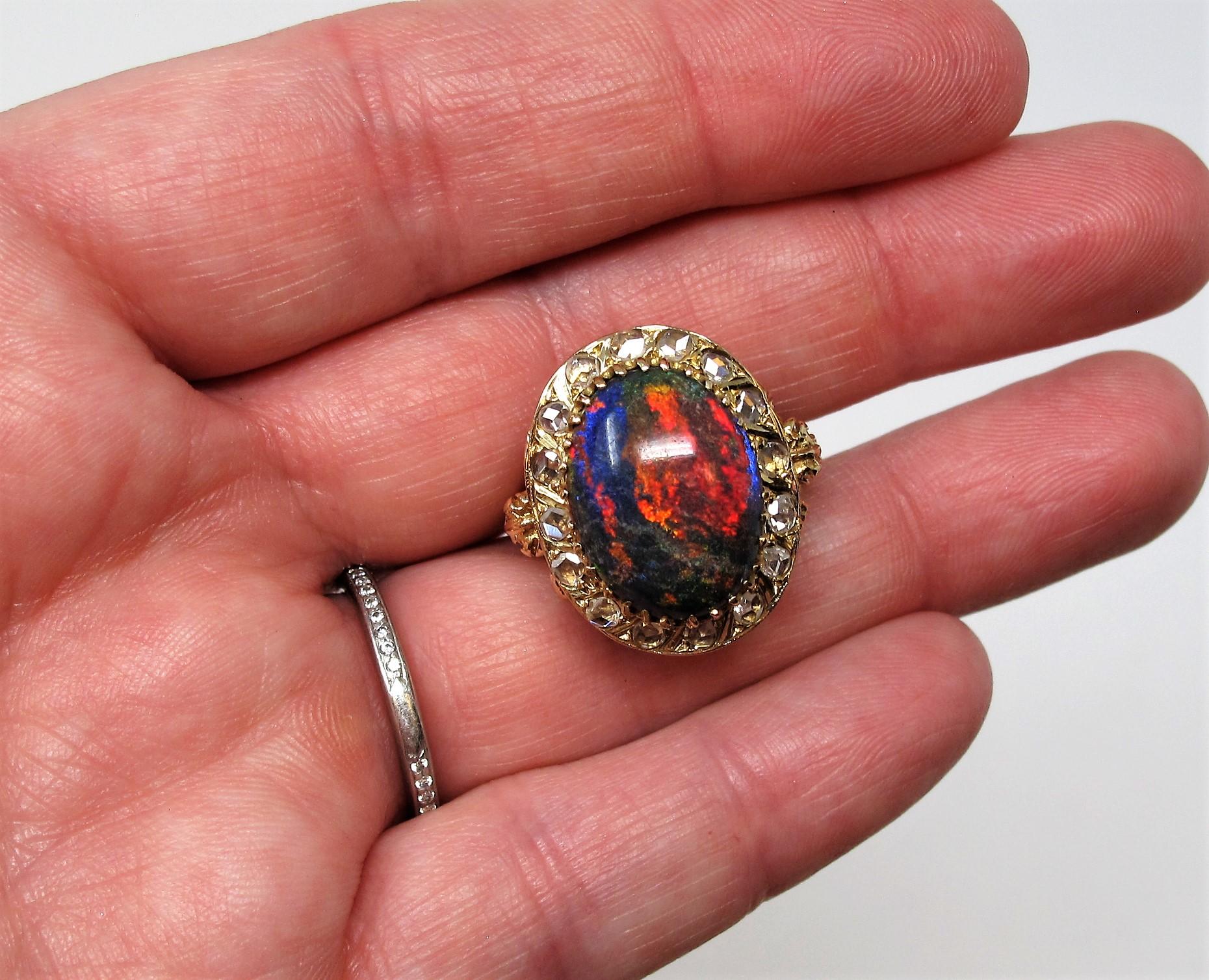 9.21 Carat Oval Cabochon Black Opal and Diamond Halo Cocktail Ring 14 Karat Gold For Sale 5