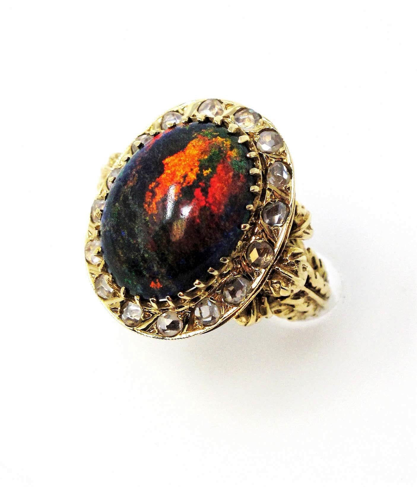 9.21 Carat Oval Cabochon Black Opal and Diamond Halo Cocktail Ring 14 Karat Gold For Sale 1