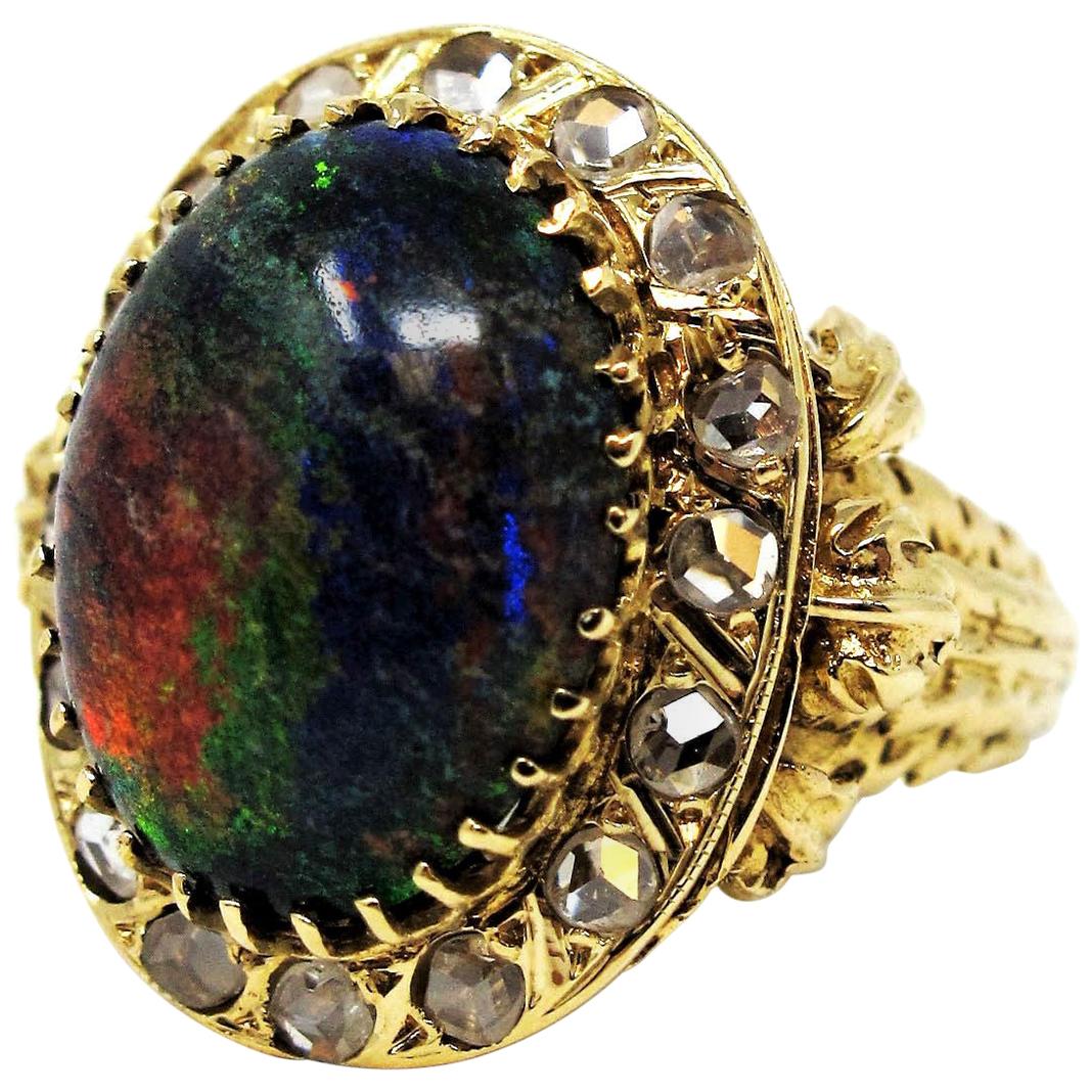 9.21 Carat Oval Cabochon Black Opal and Diamond Halo Cocktail Ring 14 Karat Gold For Sale