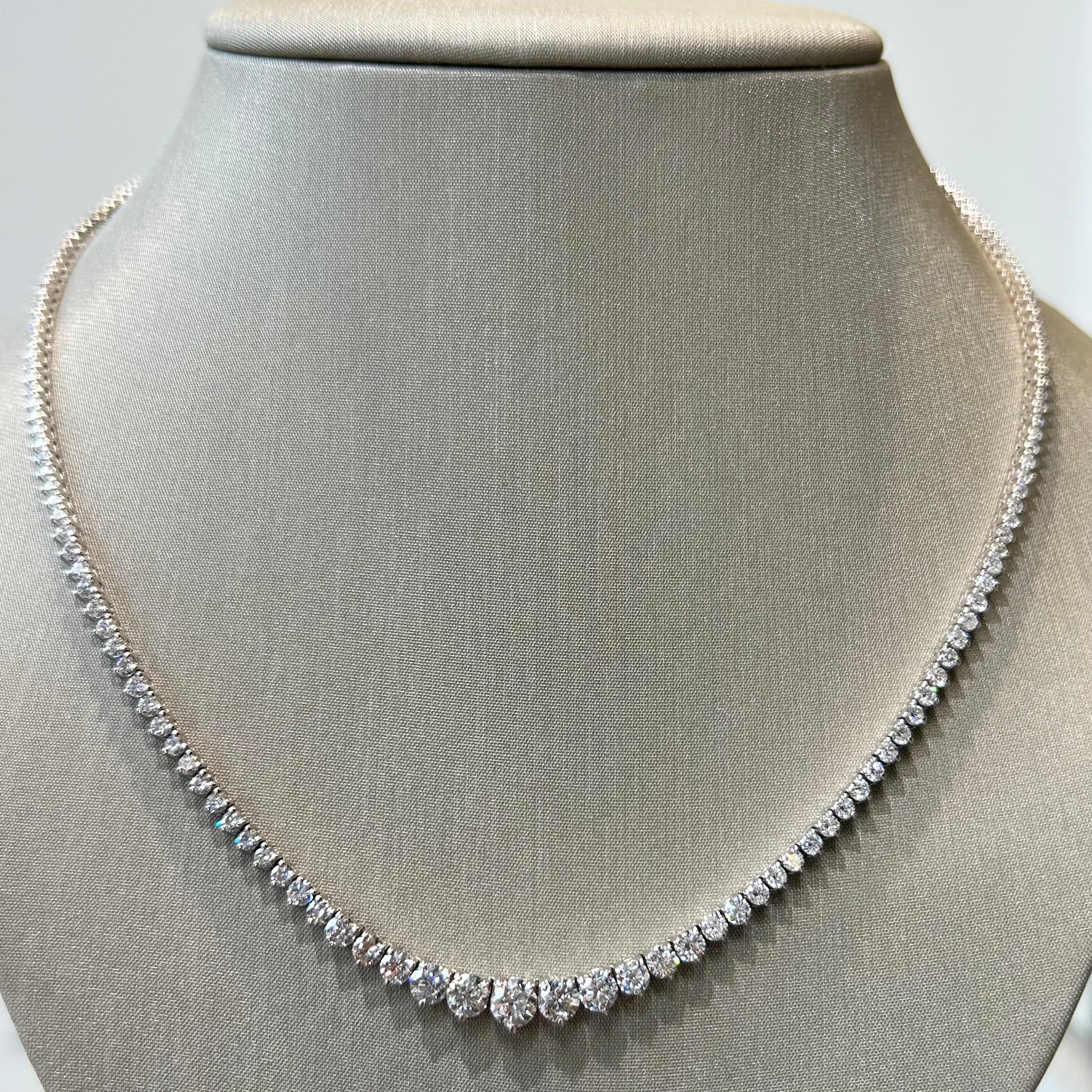 Beautiful Graduating Diamond tennis necklace. 
17 “ . The center stone is 0.54 ct . On This Necklace the Diamonds color is G-H and the Diamonds Clarity is SI2 . This is a stunning piece to own or to gift someone you love . 