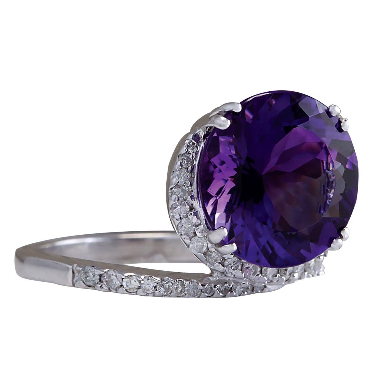 Stamped: 14K White Gold
Total Ring Weight: 7.0 Grams
Total Natural Amethyst Weight is 8.87 Carat (Measures: 13.00x13.00 mm)
Color: Purple
Total Natural Diamond Weight is 0.35 Carat
Color: F-G, Clarity: VS2-SI1
Face Measures: 15.90x14.50 mm
Sku: