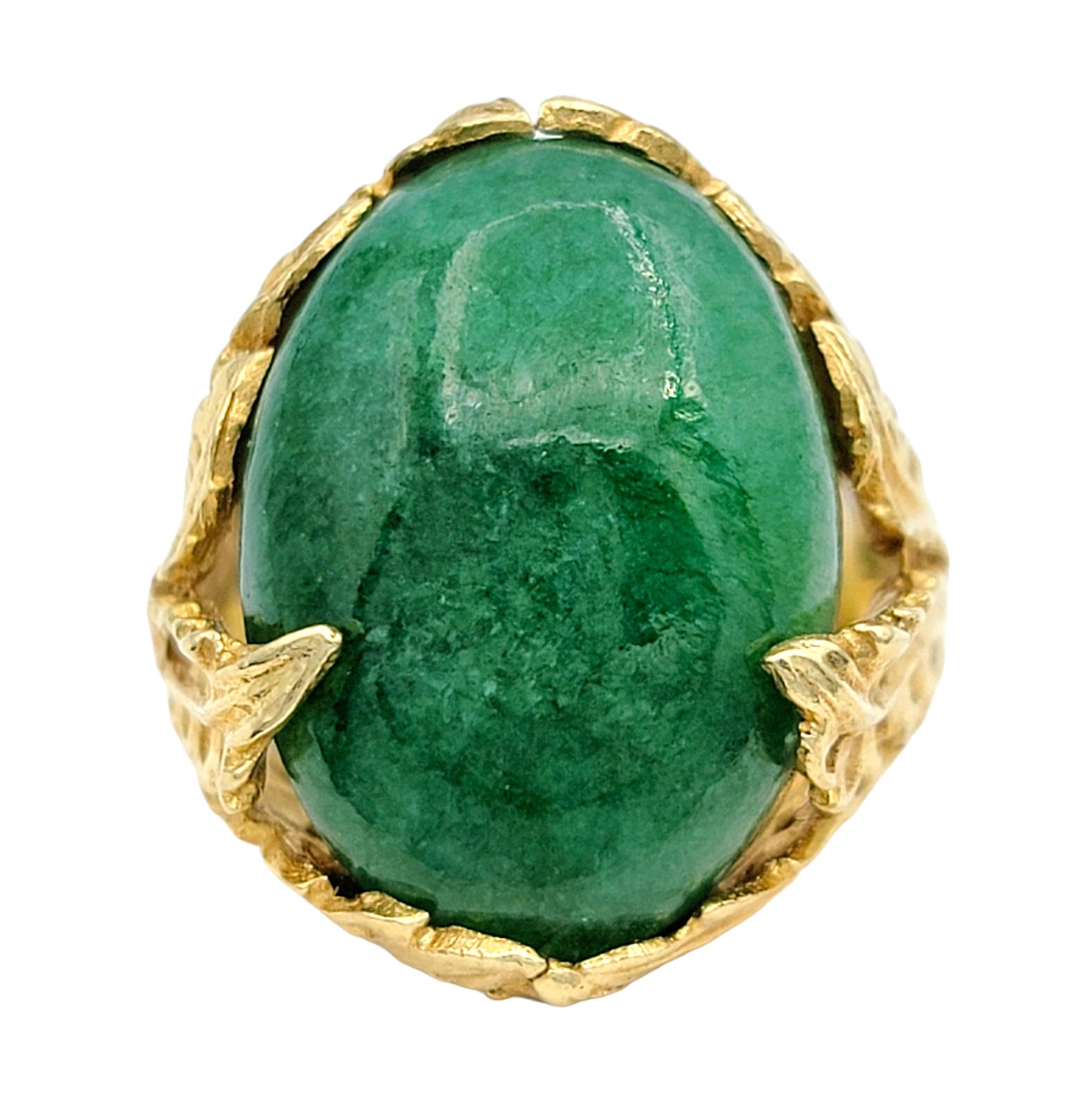 Contemporary 9.22 Carat Oval Cabochon Green Jade Ring with Leaf Design in 14 Karat Gold For Sale