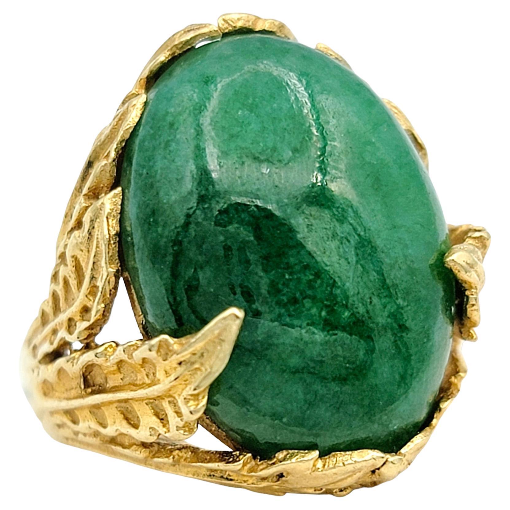 9.22 Carat Oval Cabochon Green Jade Ring with Leaf Design in 14 Karat Gold For Sale