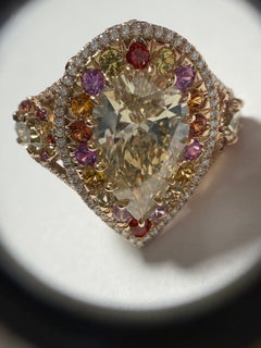 9.22 Carat TW Fancy Light Yellow Pear Shape Multi Colored Sapphires Halo Ring YG