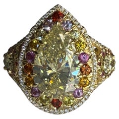 9.22 Carat TW Fancy Light Yellow Pear Shape Multi Colored Sapphires Halo Ring YG