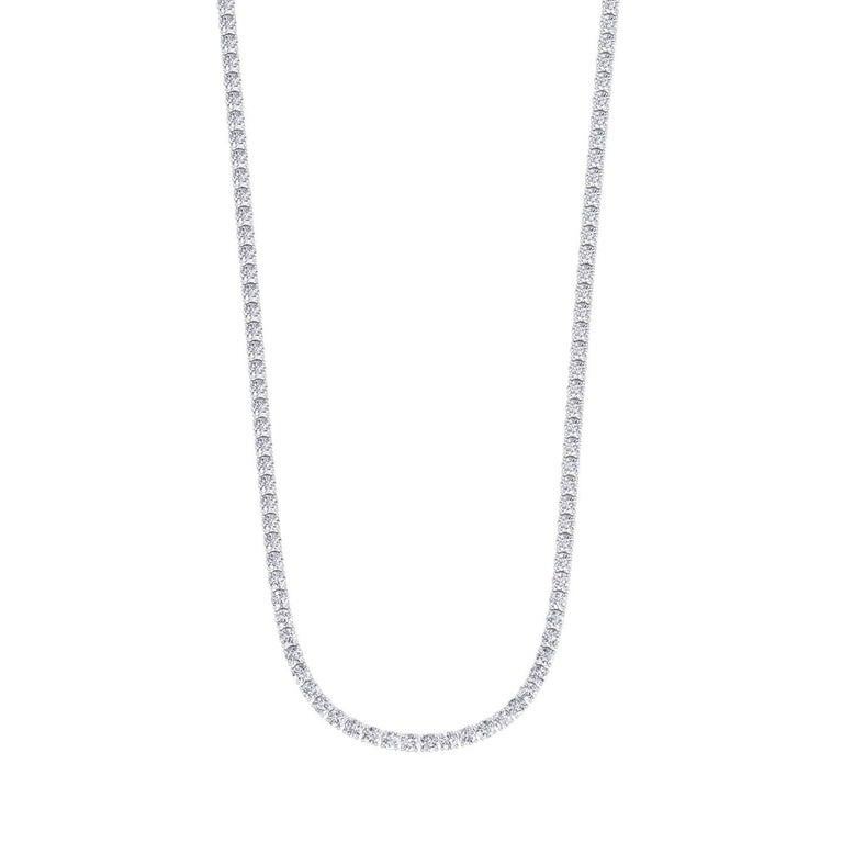 This 9 Carat Classic Diamond Tennis Necklace is a must-have. This is one of our best sellers simply because of its simplicity and timelessness. This Diamond Necklace will never go out of style and is so easy to layer and match with any other jewelry