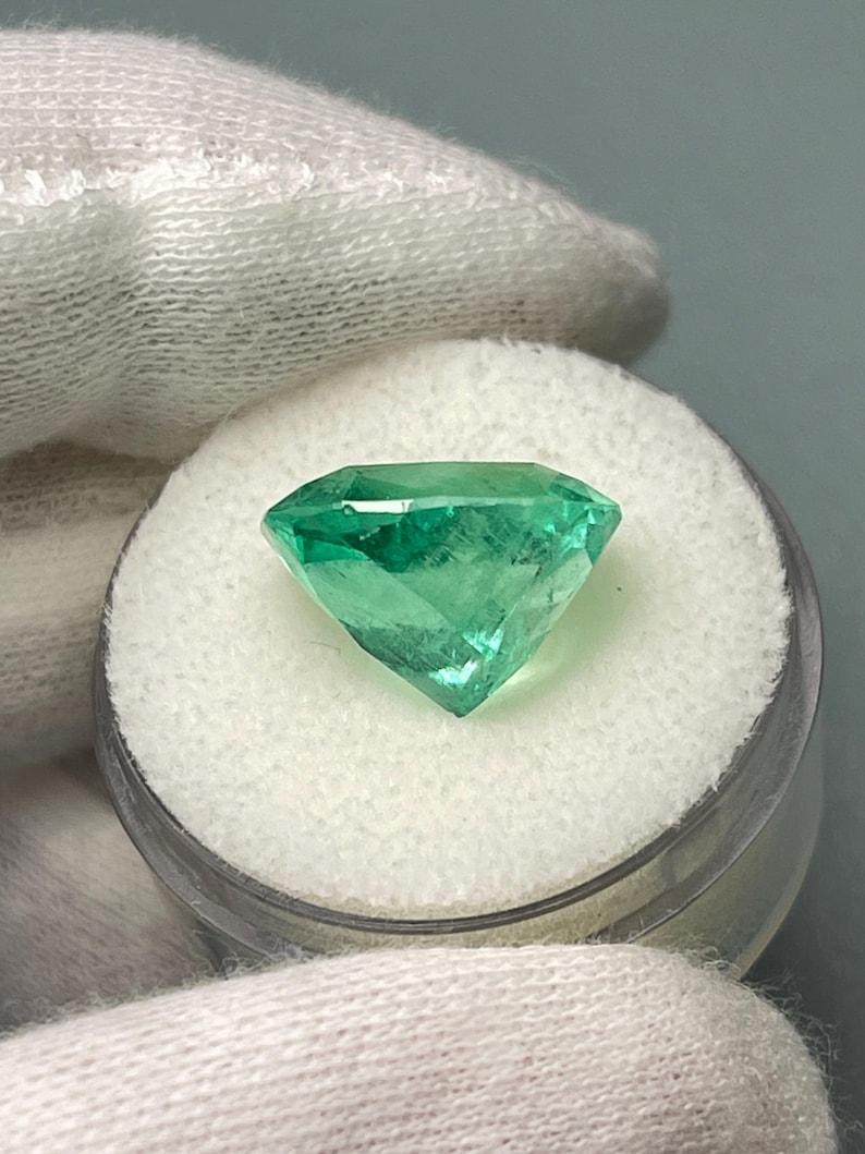 9.23 Carat Muzo Yellowish Green Colombian Emerald - Elongated Cushion Cut Gem For Sale 2
