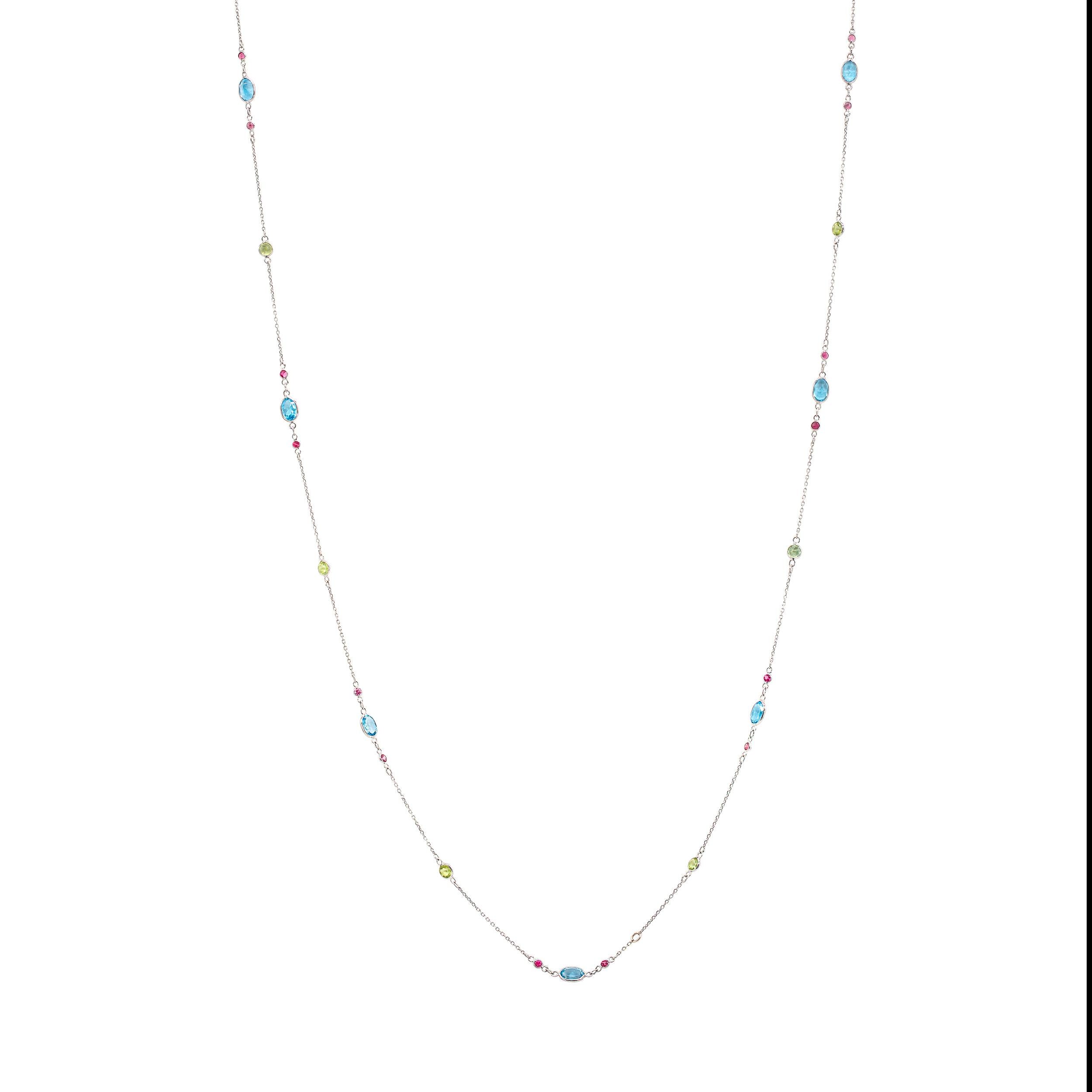 With the combination of 8 different colors of gemstones, there is a feeling of playfulness and fun, which is why we decided to call this set Clementine. This pendant and coordinating necklace are light, airy and nothing short of joyful. The long