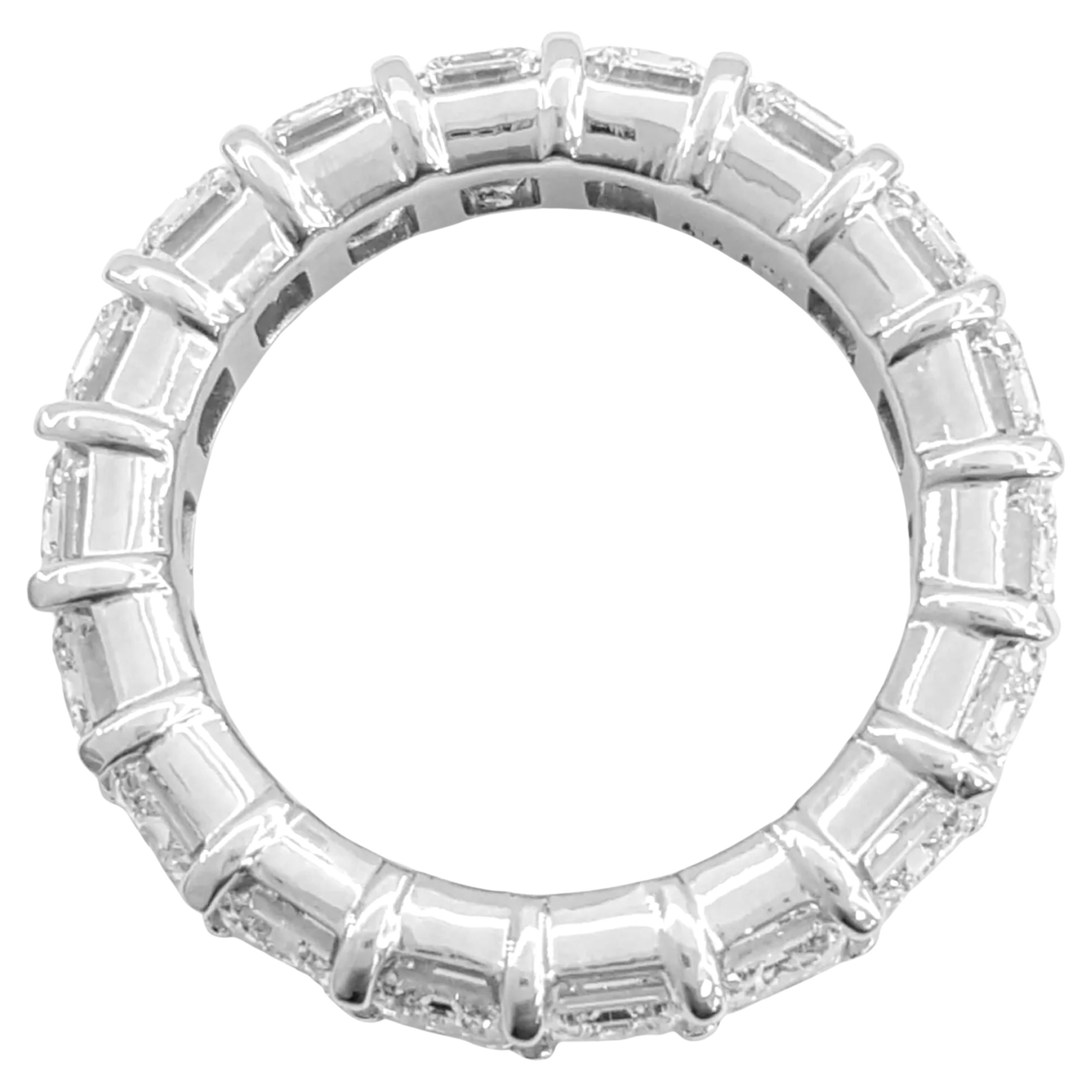 Platinum Emerald Cut Diamond Full Circle Eternity Ring, perfect for any special occasion! This exquisite piece showcases 18 natural emerald cut diamonds totaling an impressive 9.24 carats. Each diamond is expertly set to maximize its brilliance,