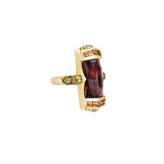 Sunita Nahata Garnet 9.25ct. Cocktail Ring in 18KYG with Gemstone & Diamond.